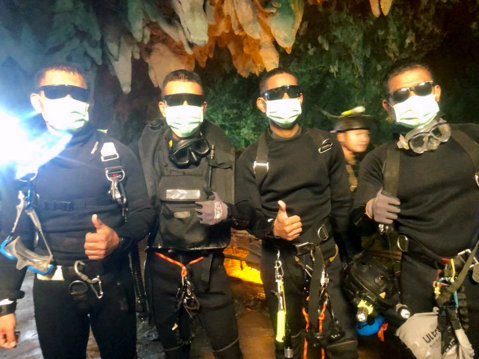 Four Thai Navy Seals are seen after leaving the cave during the rescue mission in Chiang Rai