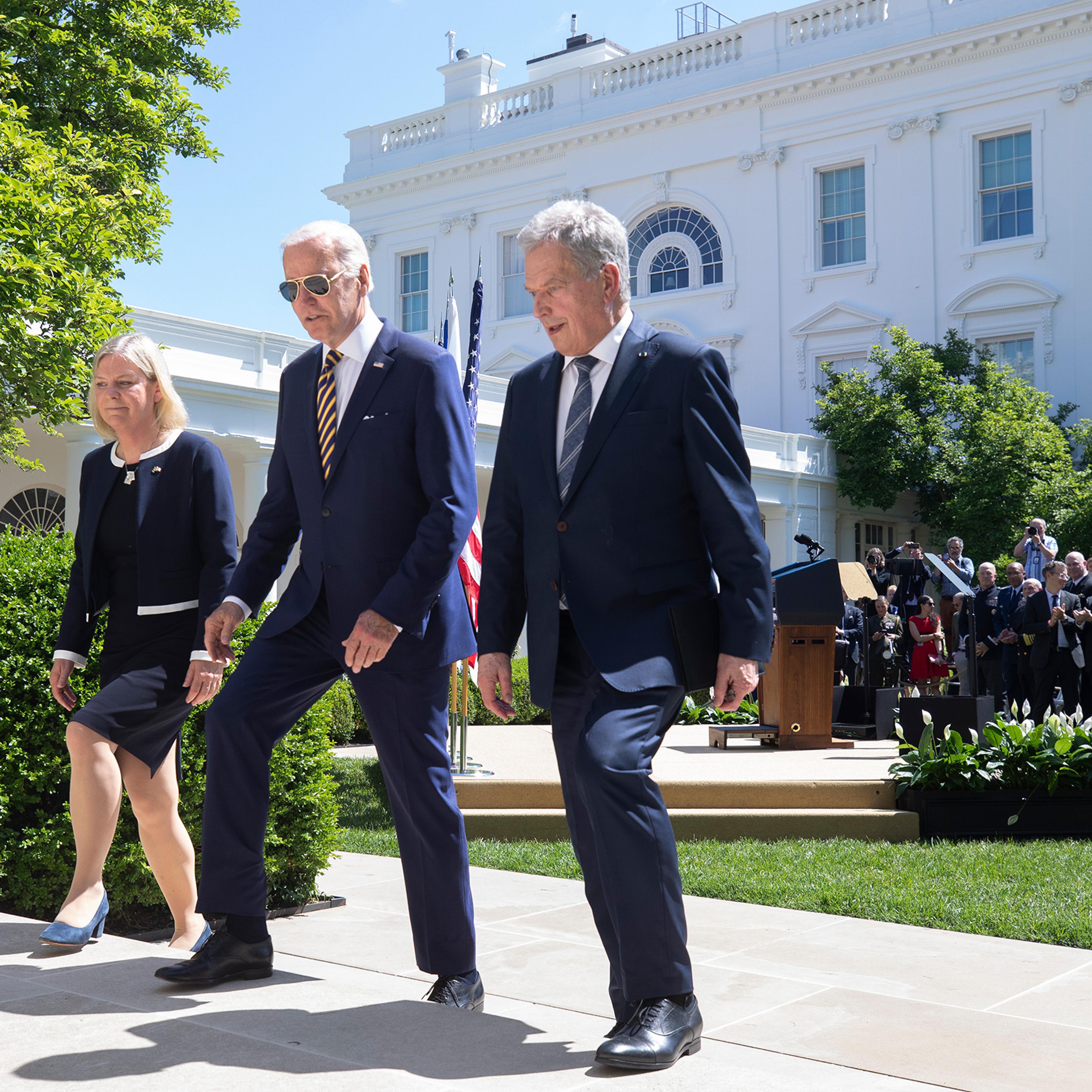 U.S. President Joe Biden (C), Prime Minister Magdalena Andersson of Sweden(L), and President Sauli Niinisto of Finland(R) depart after speaking to the media following their meeting on Finland's and Sweden's NATO applications in the Rose Garden of the White House, May 19, 2022.