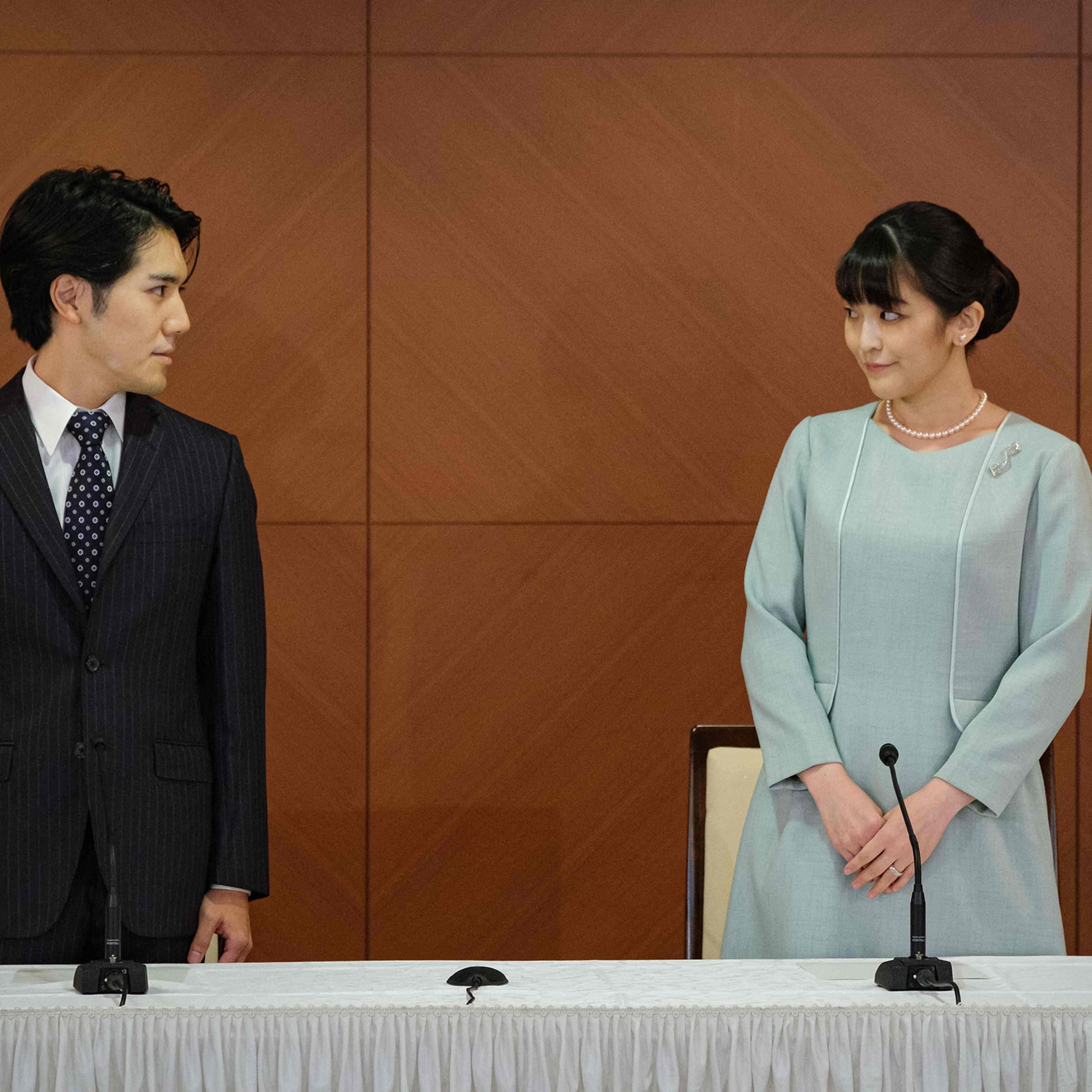 Japan's former Princess Mako (right), and her husband Kei Komuro speak at a press conference to announce they have married, at the Grand Arc Hotel in Tokyo on Oct. 26, 2021.