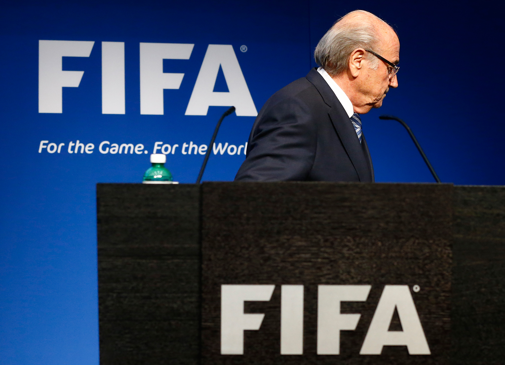 FIFA President Sepp Blatter leaves after his statement during a news conference at the FIFA headquarters in Zurich, Switzerland, June 2, 2015. Blatter resigned as FIFA president on Tuesday, four days after being re-elected to a fifth term. Blatter, 79, a