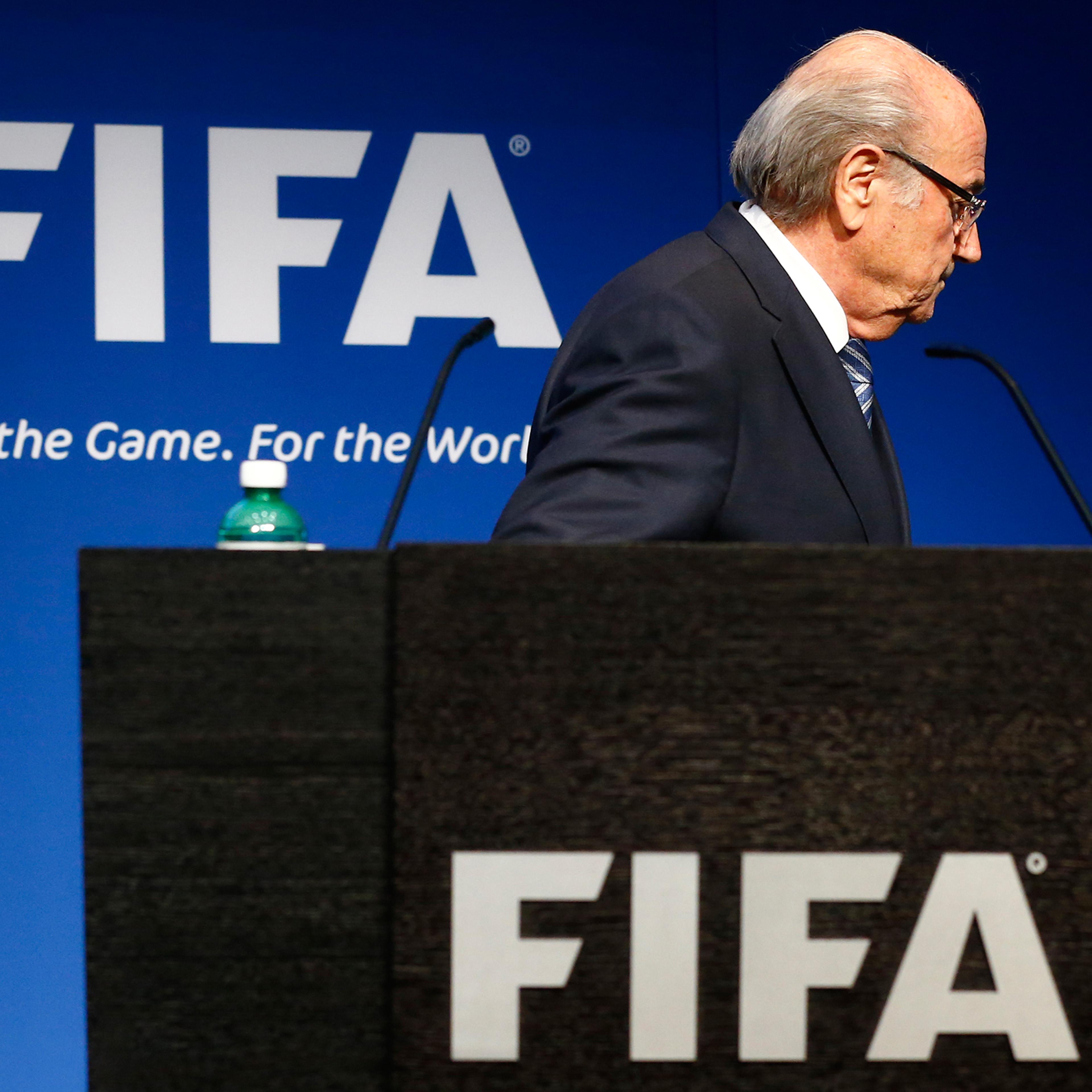 FIFA President Sepp Blatter leaves after his statement during a news conference at the FIFA headquarters in Zurich, Switzerland, June 2, 2015. Blatter resigned as FIFA president on Tuesday, four days after being re-elected to a fifth term. Blatter, 79, a