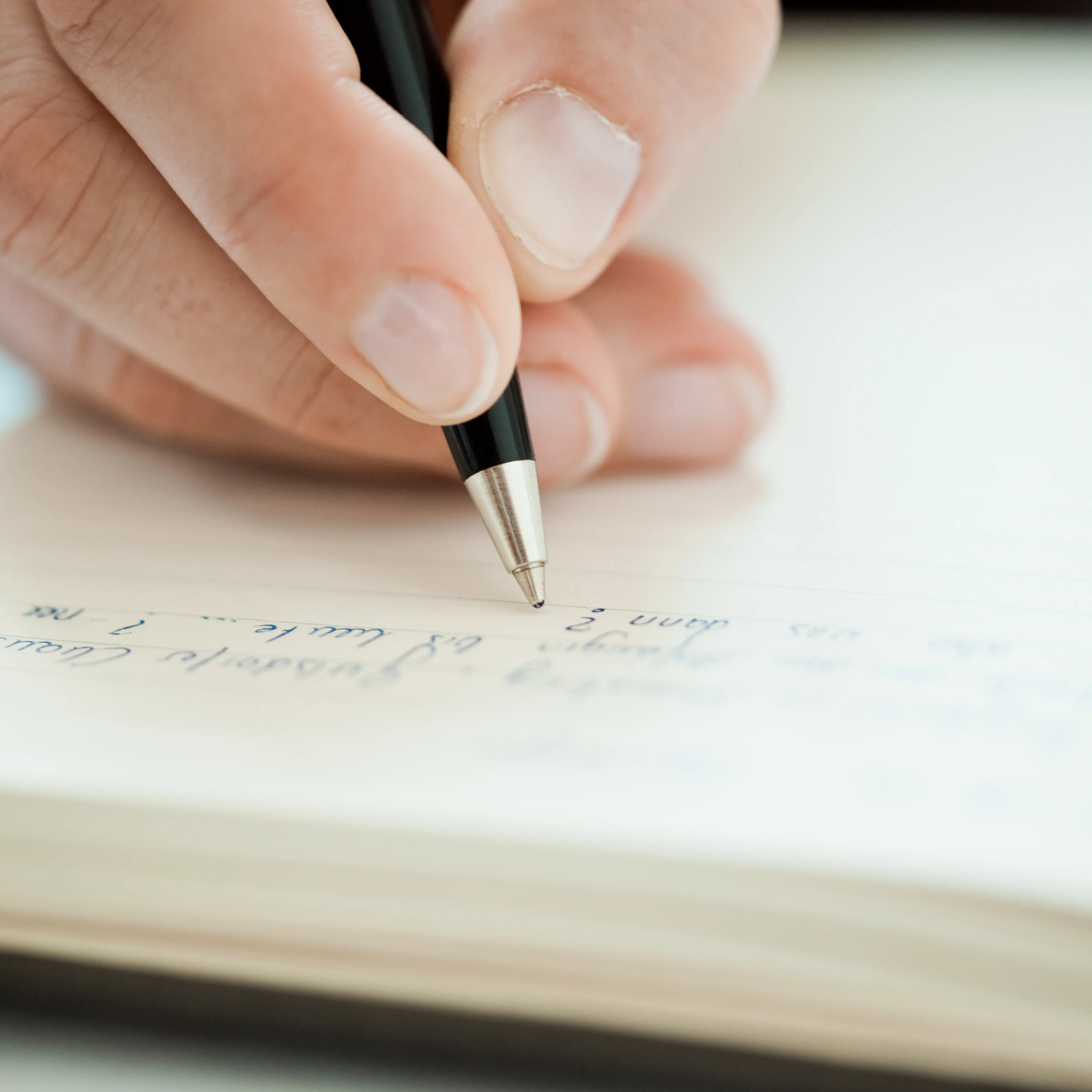 hand-writing-pen-notebook