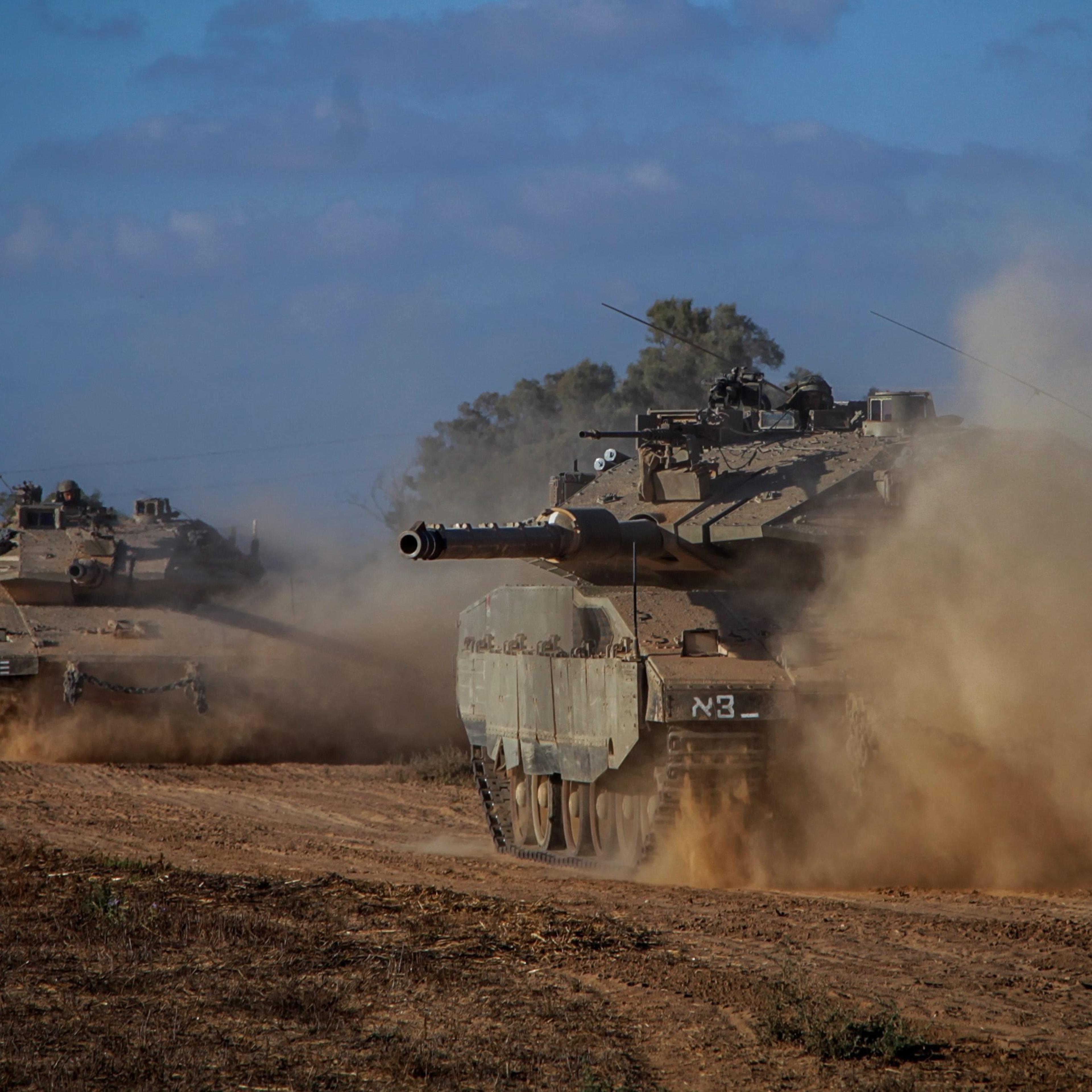 Israeli Markava tanks heading toward the Israeli-Gaza border early on July 18, 2014.