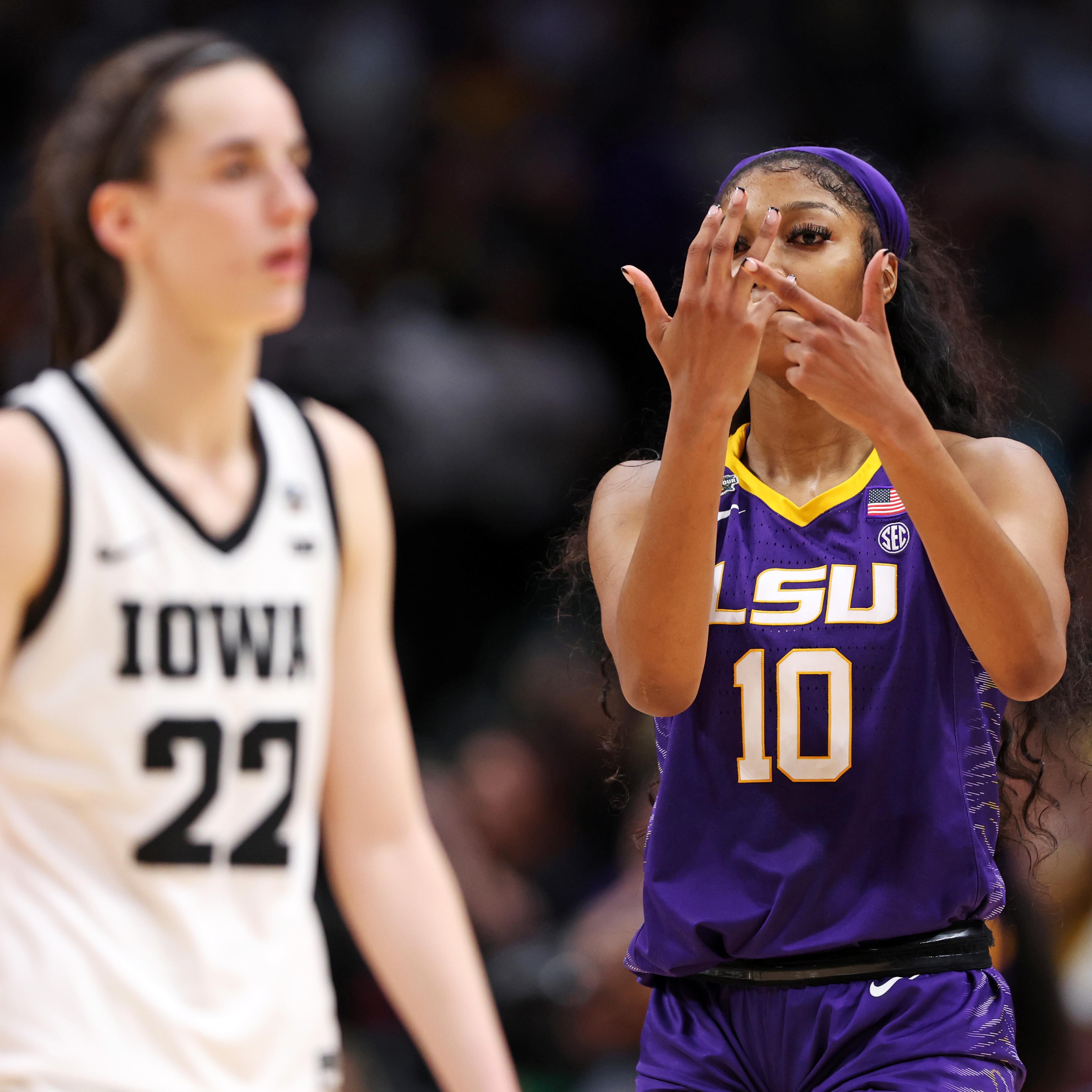 Angel Reese of the LSU Lady Tigers reacts towards Caitlin Clarkof the Iowa Hawkeyes during the fourth quarter during the 2023 NCAA Women’s Basketball Tournament championship game
