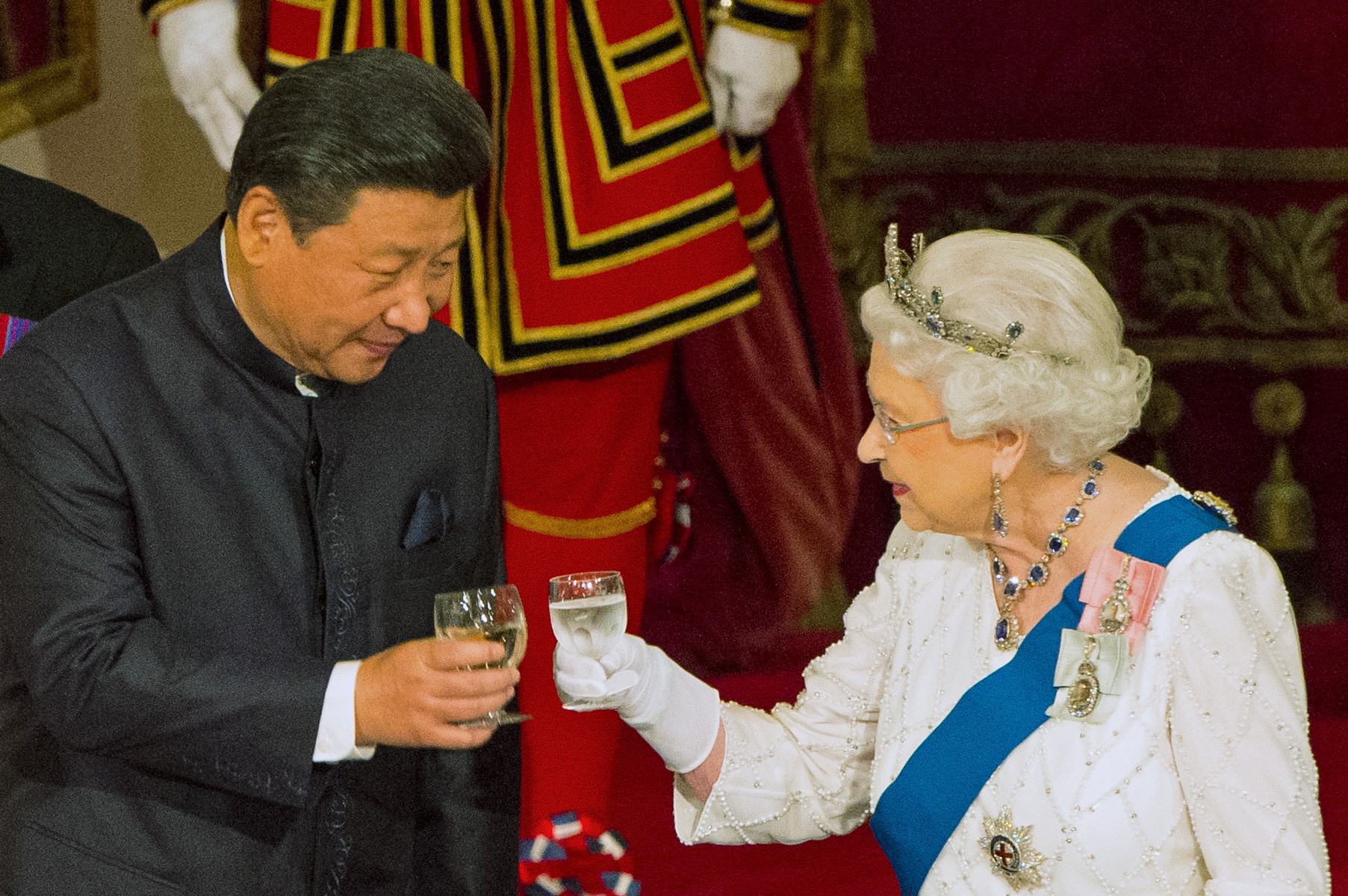 Chinese President Xi Jinping with Queen Elizabeth II at a state banquet at Buckingham Palace, London, during the first day of his state visit to Britain