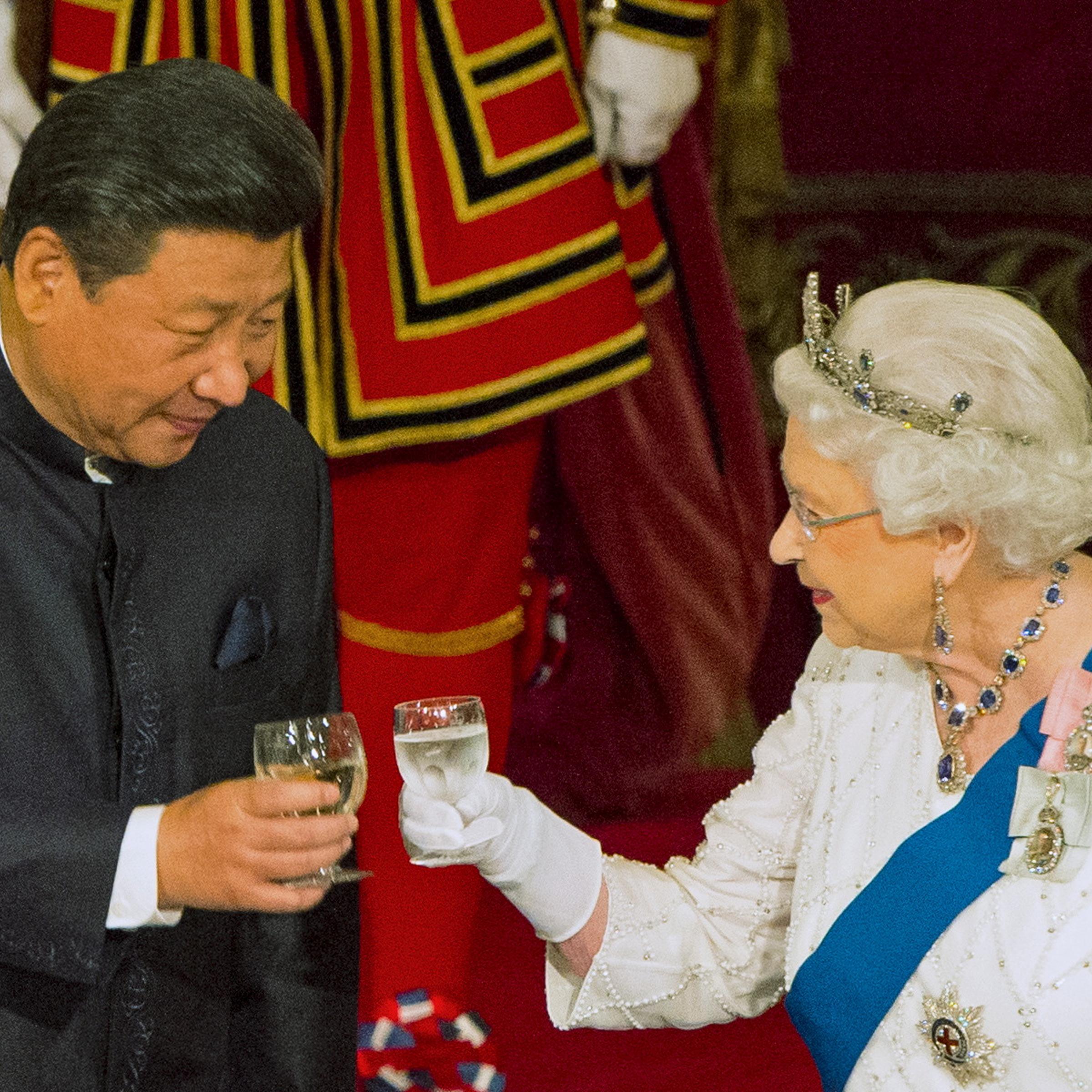 Chinese President Xi Jinping with Queen Elizabeth II at a state banquet at Buckingham Palace, London, during the first day of his state visit to Britain