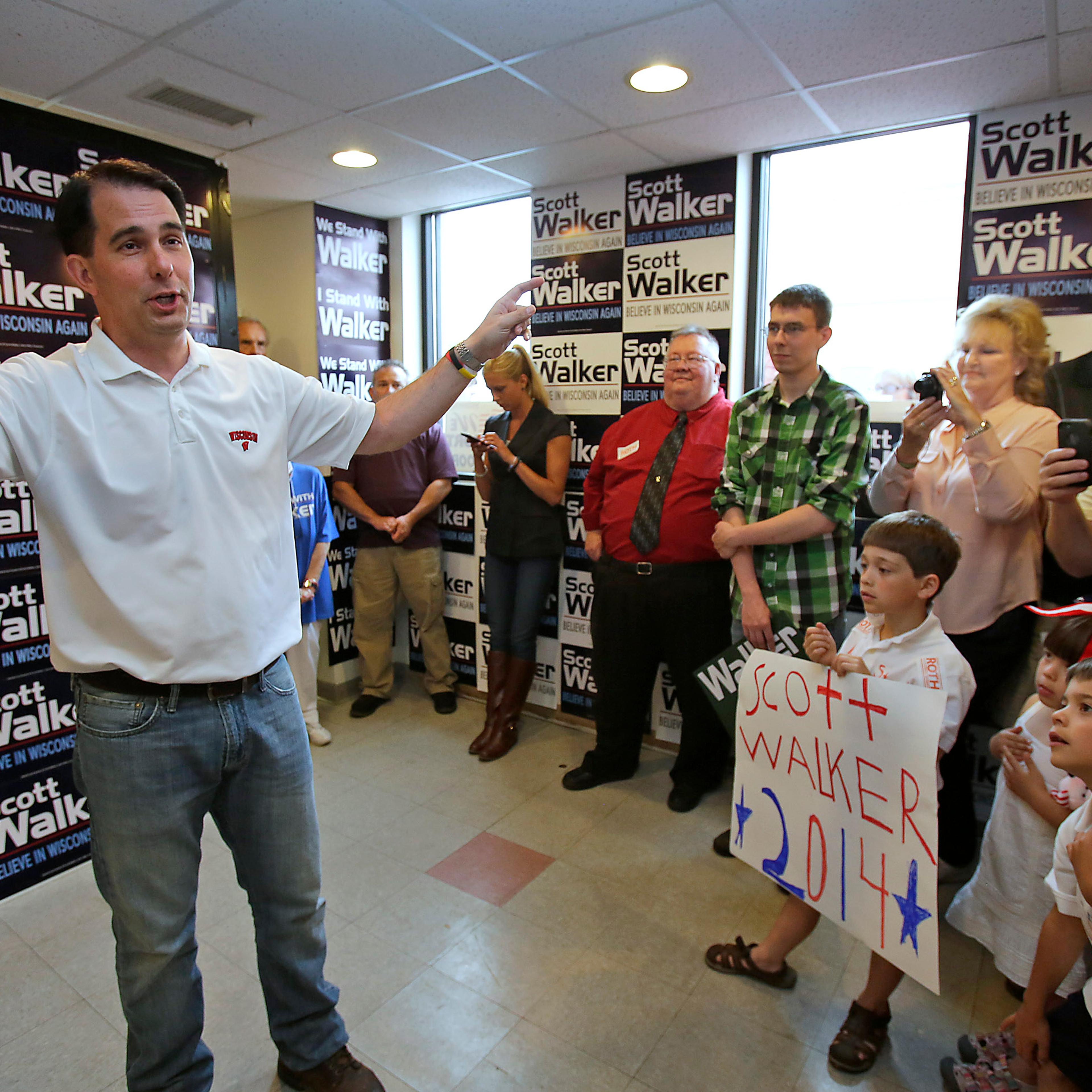 Wisconsin Governor Scott Walker makes a stop at the Republican Party of Wisconsin Appleton Headquarters Saturday, June 21, 2014 in Appleton, Wis.