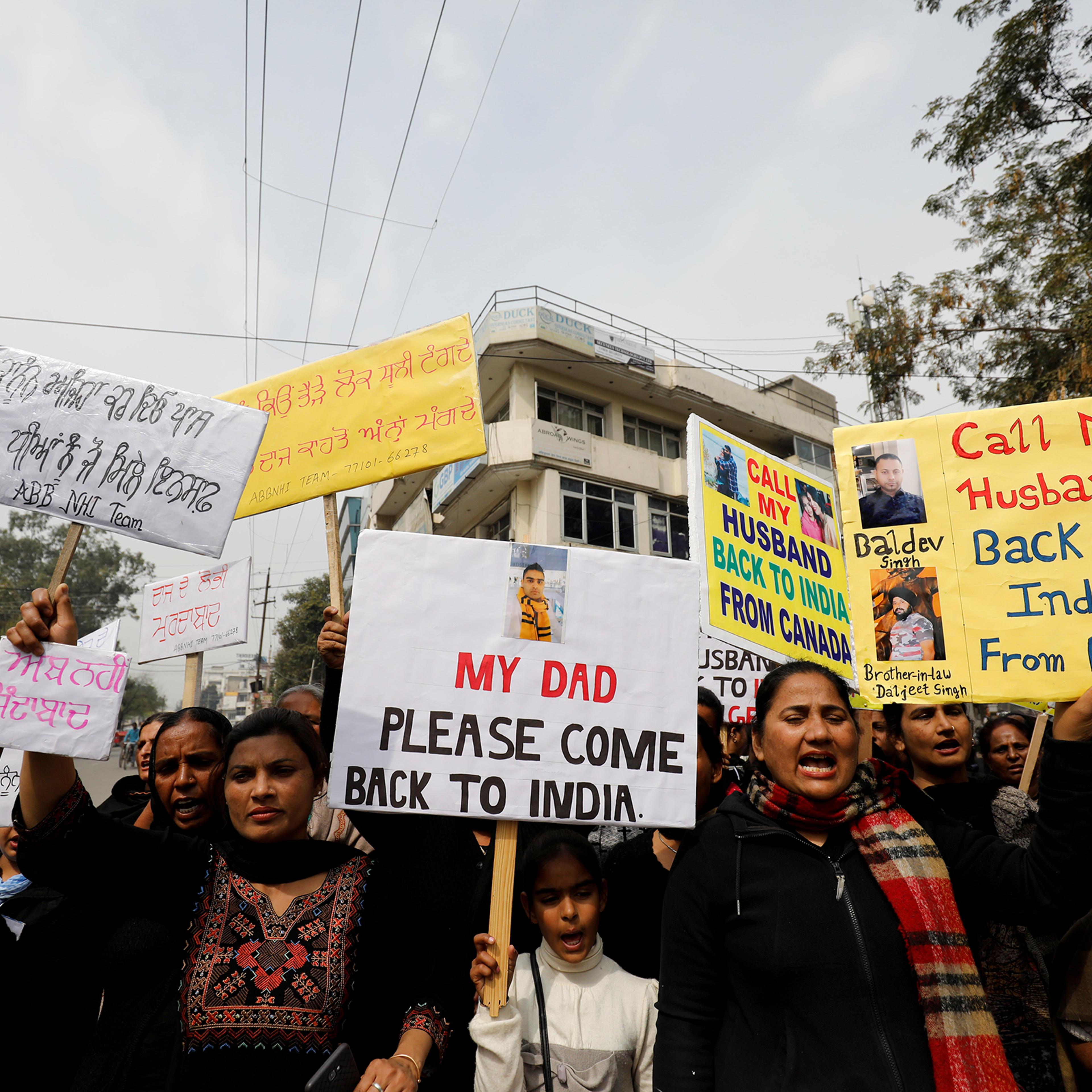 Women who say they have been abandoned by Non-Resident Indian husbands take part in an organiszd protest in Jalandhar, Punjab, India, on March 8, 2019.