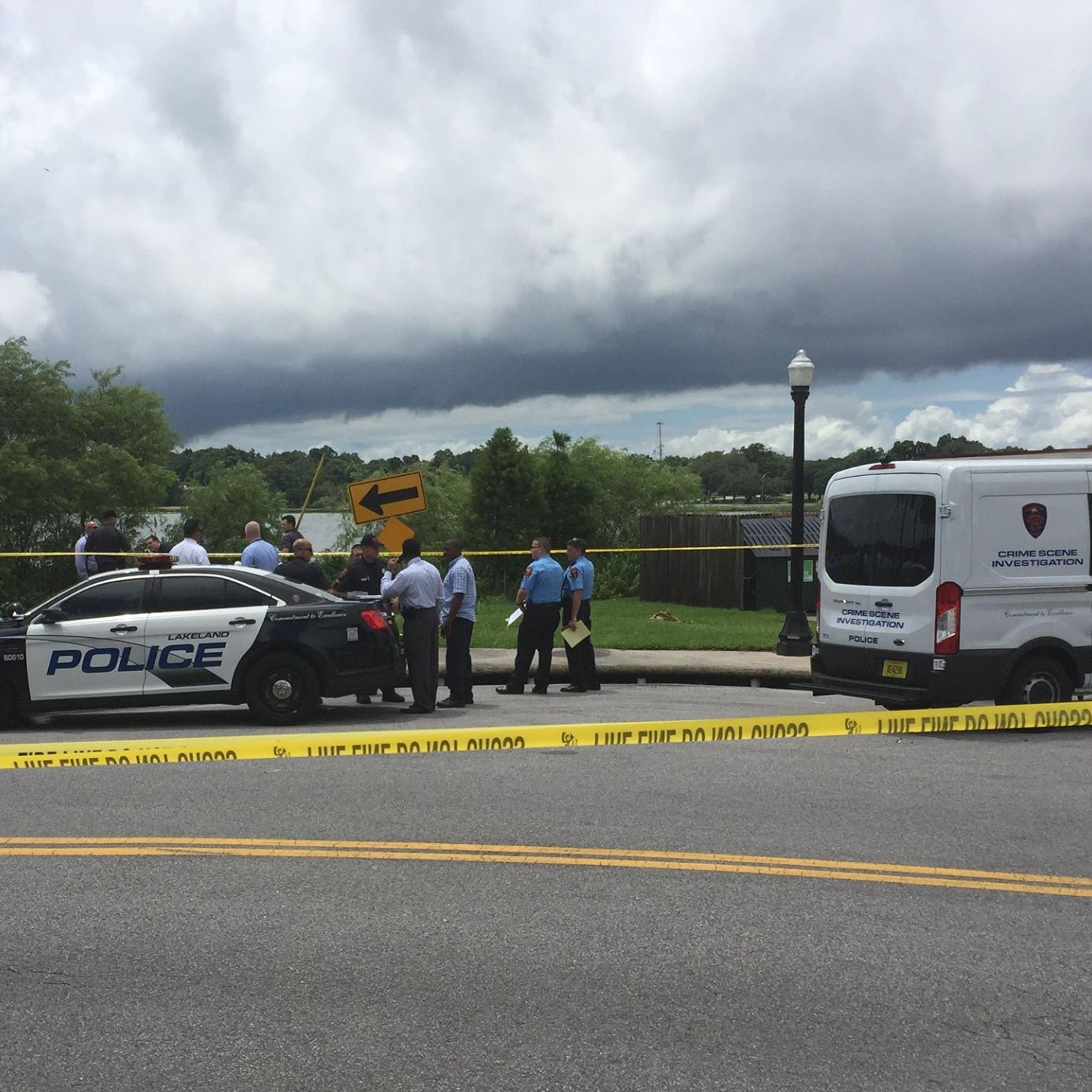 Lakeland Police Department responding to a citizen 911 call of an alligator with a body in its mouth in Lakeland, Fla., June 7, 2016.