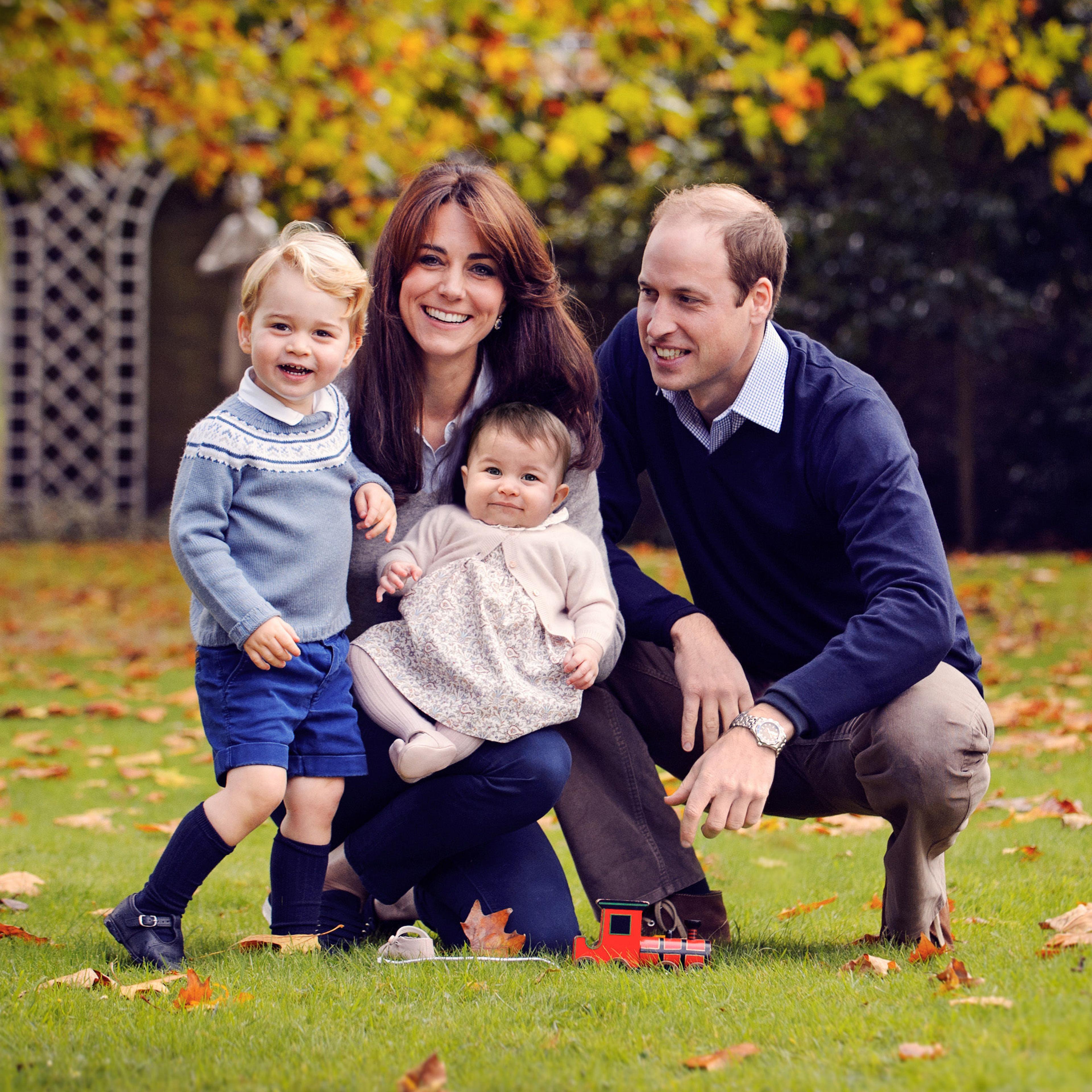 In this October handout image provided by Kensington Palace on Dec. 18, 2015, Prince William, Duke of Cambridge, and Catherine, Duchess of Cambridge, pose for a portrait with their children, Prince George and Princess Charlotte.