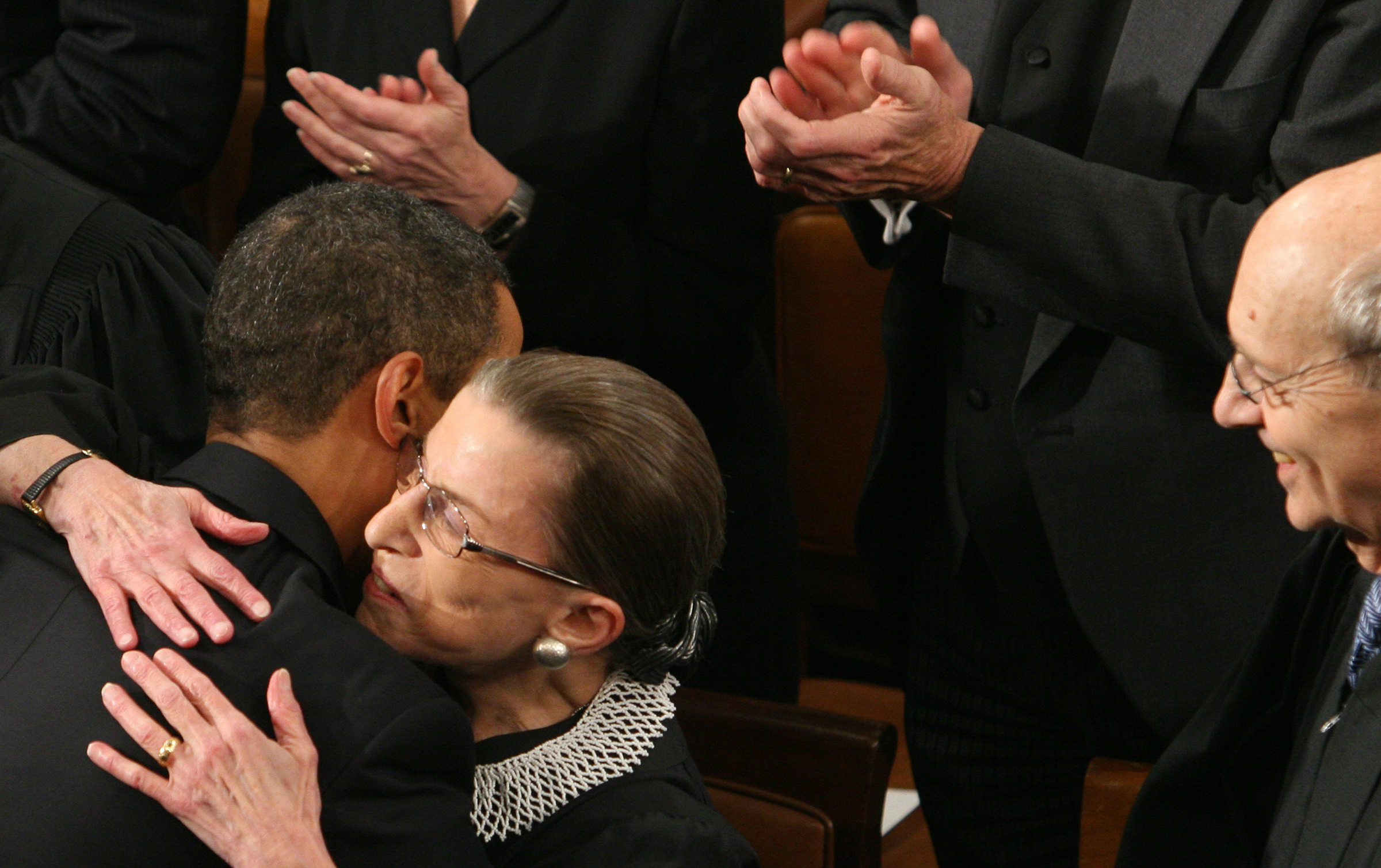 President Obama embraces Supreme Court Justice Ruth Bader Ginsburg prior to addressing a Joint Session of Congress at the Capitol in Washington, D.C., on Feb. 24, 2009. A day earlier, Ginsburg, who underwent surgery for cancer of the pancreas in early Fe