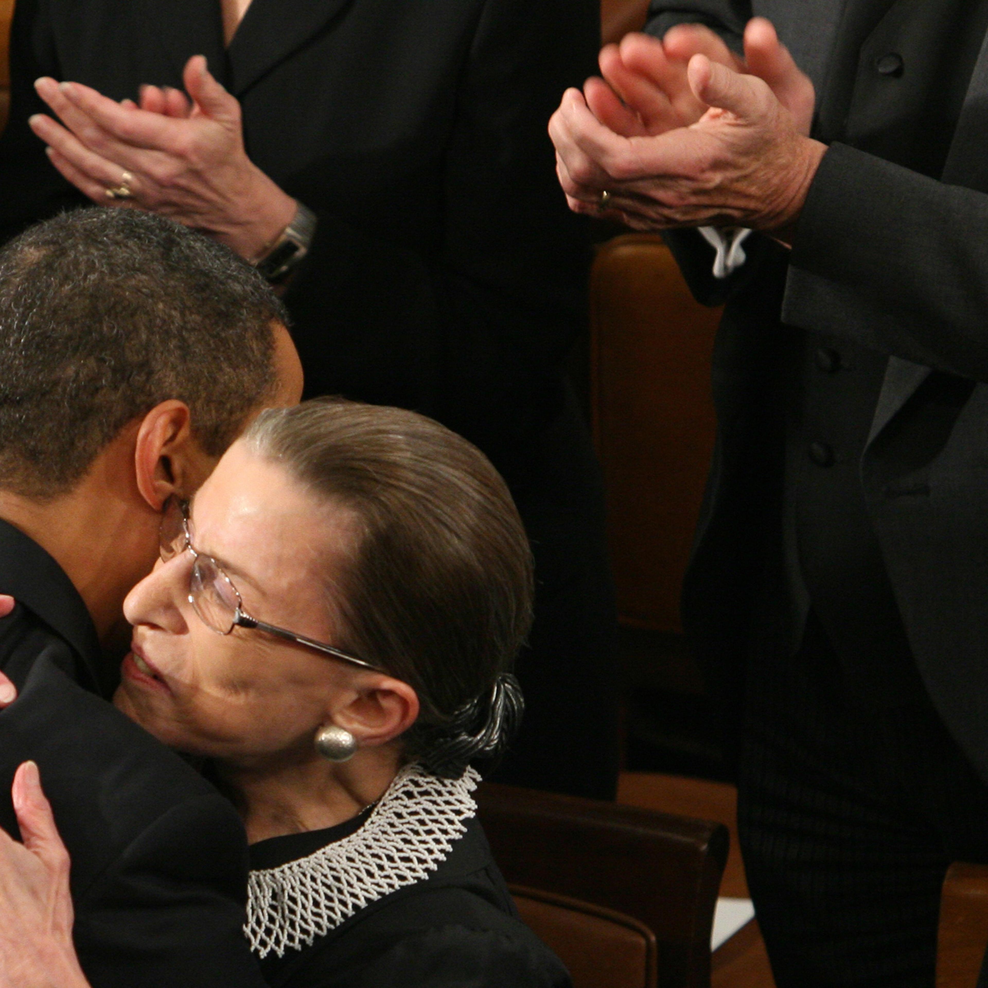 President Obama embraces Supreme Court Justice Ruth Bader Ginsburg prior to addressing a Joint Session of Congress at the Capitol in Washington, D.C., on Feb. 24, 2009. A day earlier, Ginsburg, who underwent surgery for cancer of the pancreas in early Fe