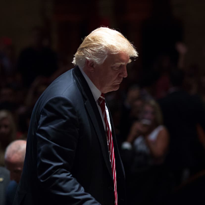 Republican presidential candidate Donald Trump walks on stage after signing autographs during a campaign stop at The Fox Theatre on June 15, 2016 in Atlanta, Georgia.