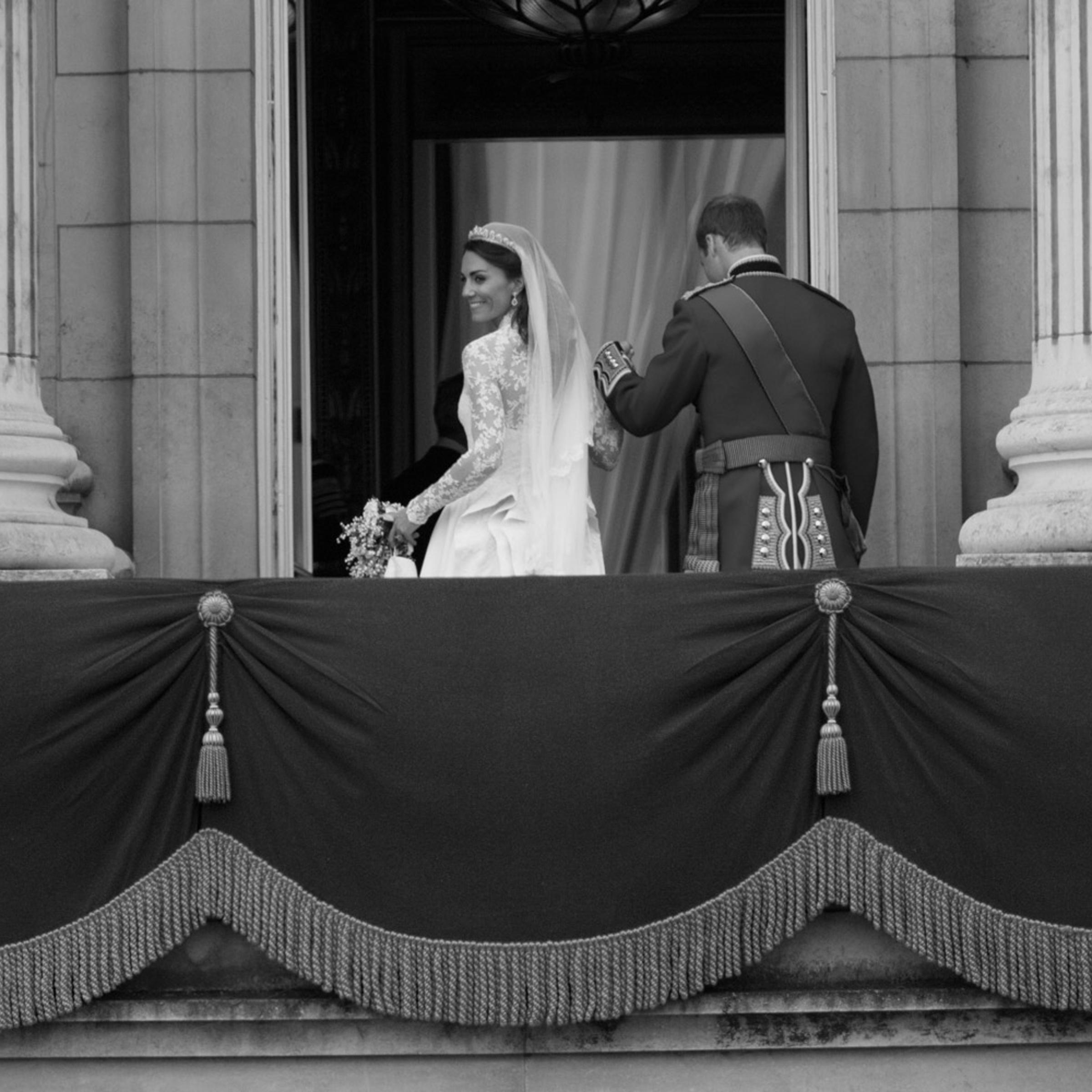 The Duchess of Cambridge gives the crowd one last glance before leaving the balcony. April 29. 2011.