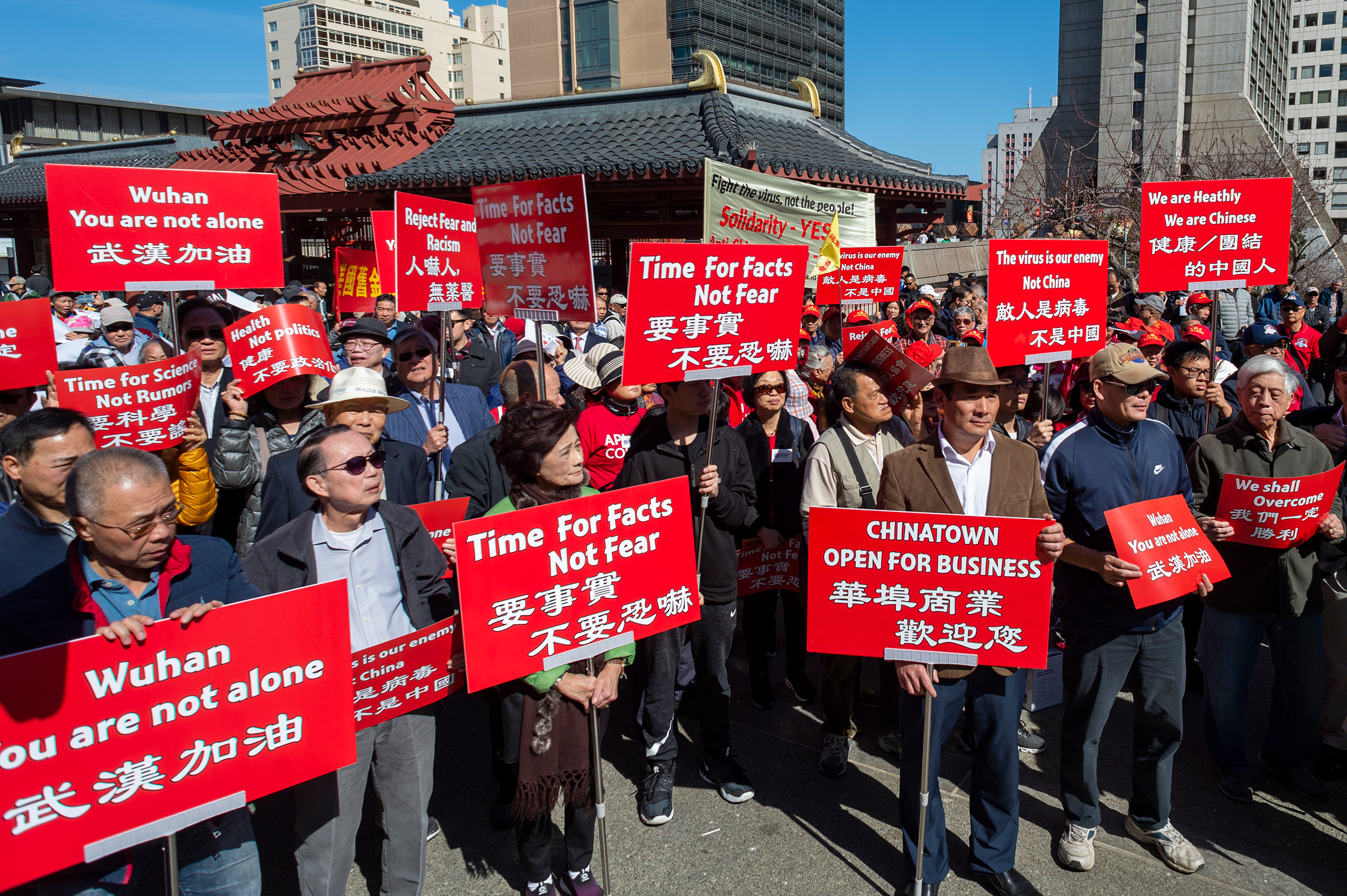 People participate in a rally in support of Chinese people and people around the world in fighting the novel coronavirus, COVID-19, in Chinatown, San Francisco on Feb. 29. The protest calls for understanding among communities and support Chinatown businesses in the U.S.