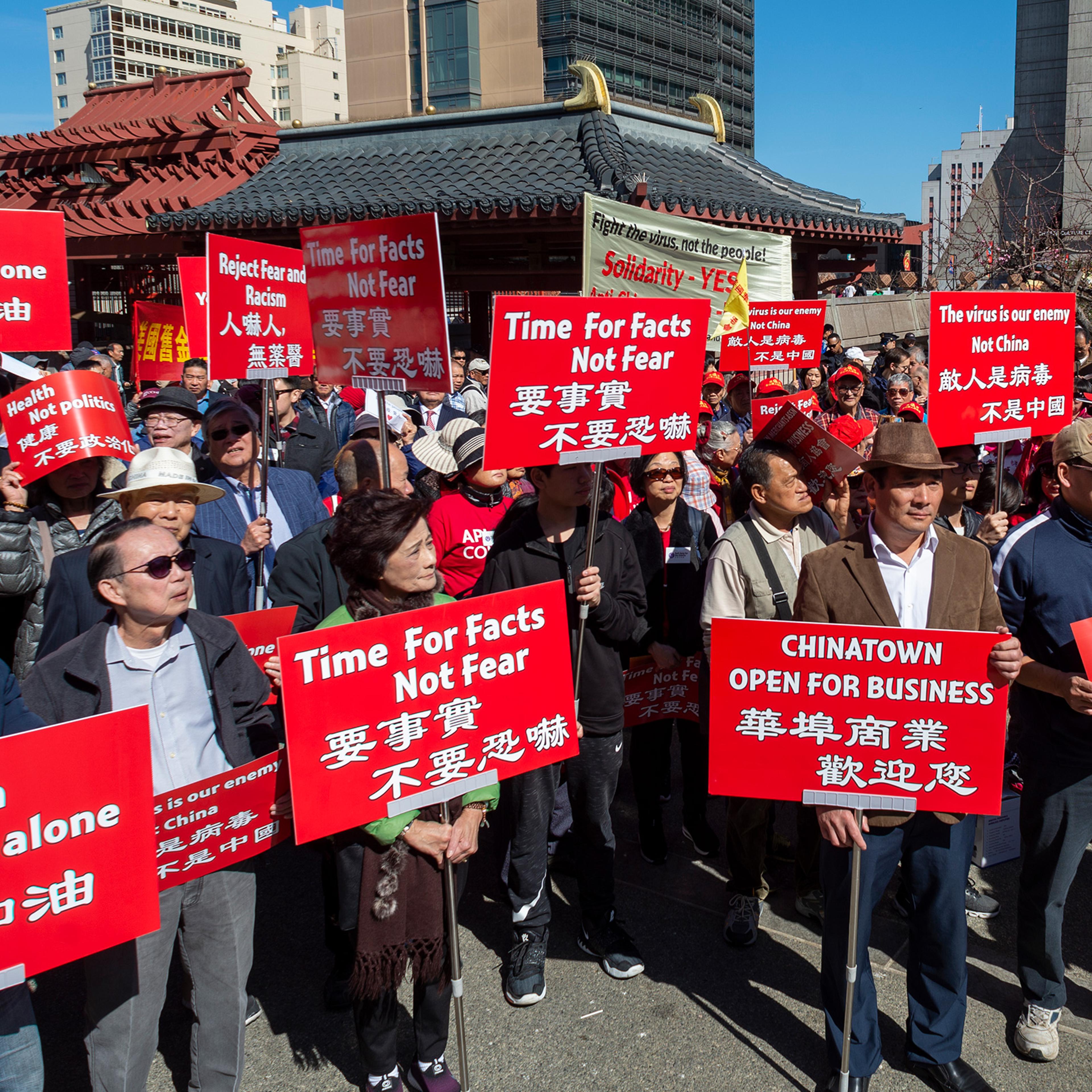People participate in a rally in support of Chinese people and people around the world in fighting the novel coronavirus, COVID-19, in Chinatown, San Francisco on Feb. 29. The protest calls for understanding among communities and support Chinatown businesses in the U.S.