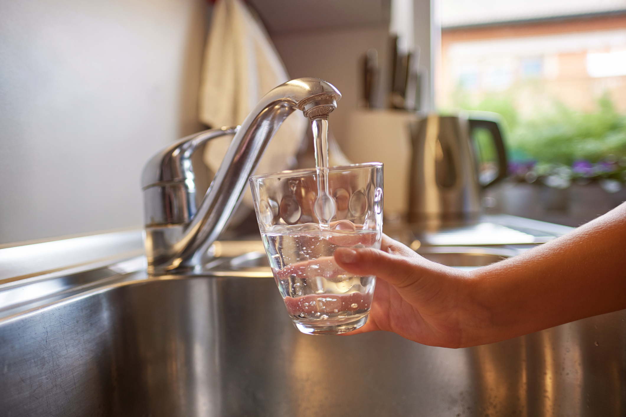 Child drinking tap water