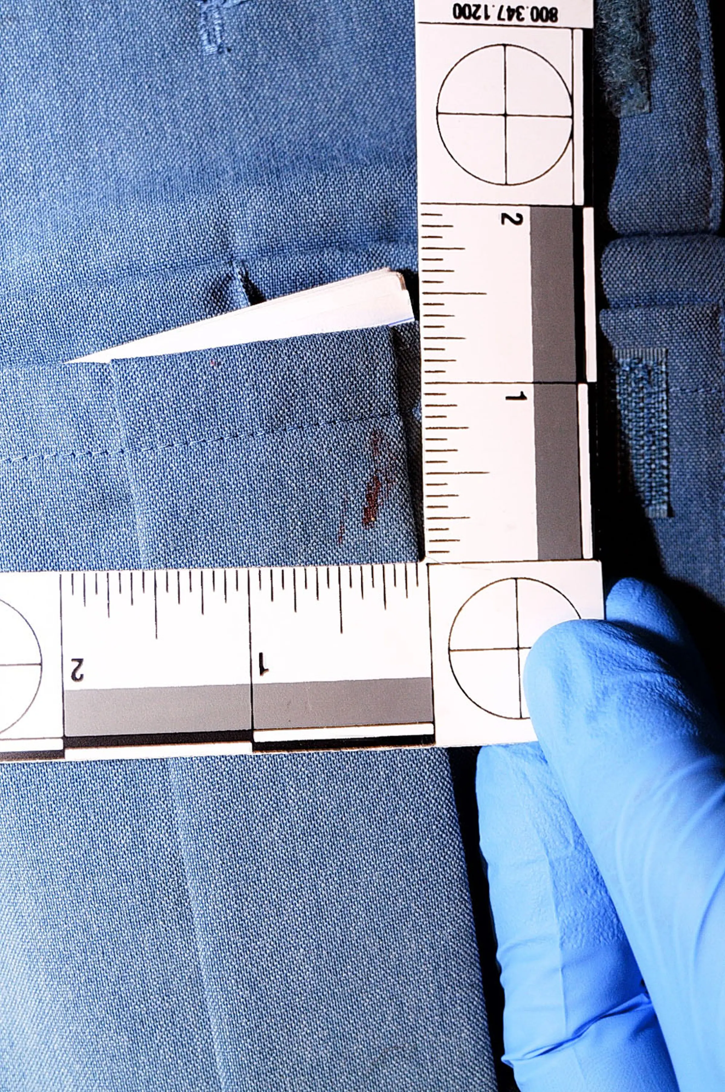 An undated evidence photograph made available by the St. Louis County prosecutors office on Nov. 25, 2014 shows Ferguson police officer Darren Wilson's uniform taken after the shooting of Michael Brown.
