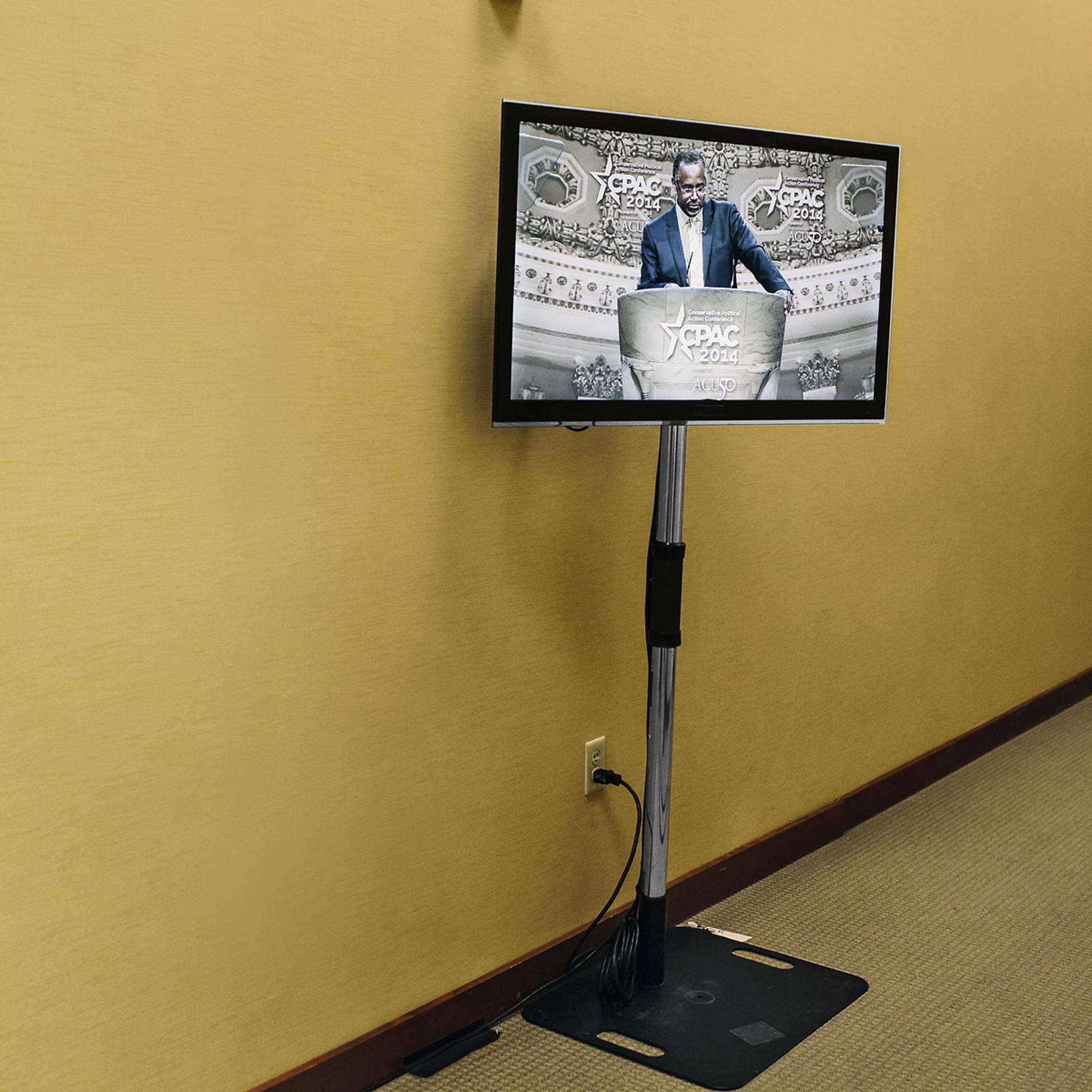 Dr. Ben Carson is shown on a screen backstage while he speaks during the final day of the Conservative Political Action Conference (CPAC) at the Gaylord National Resort & Convention Center in National Harbor, Md.