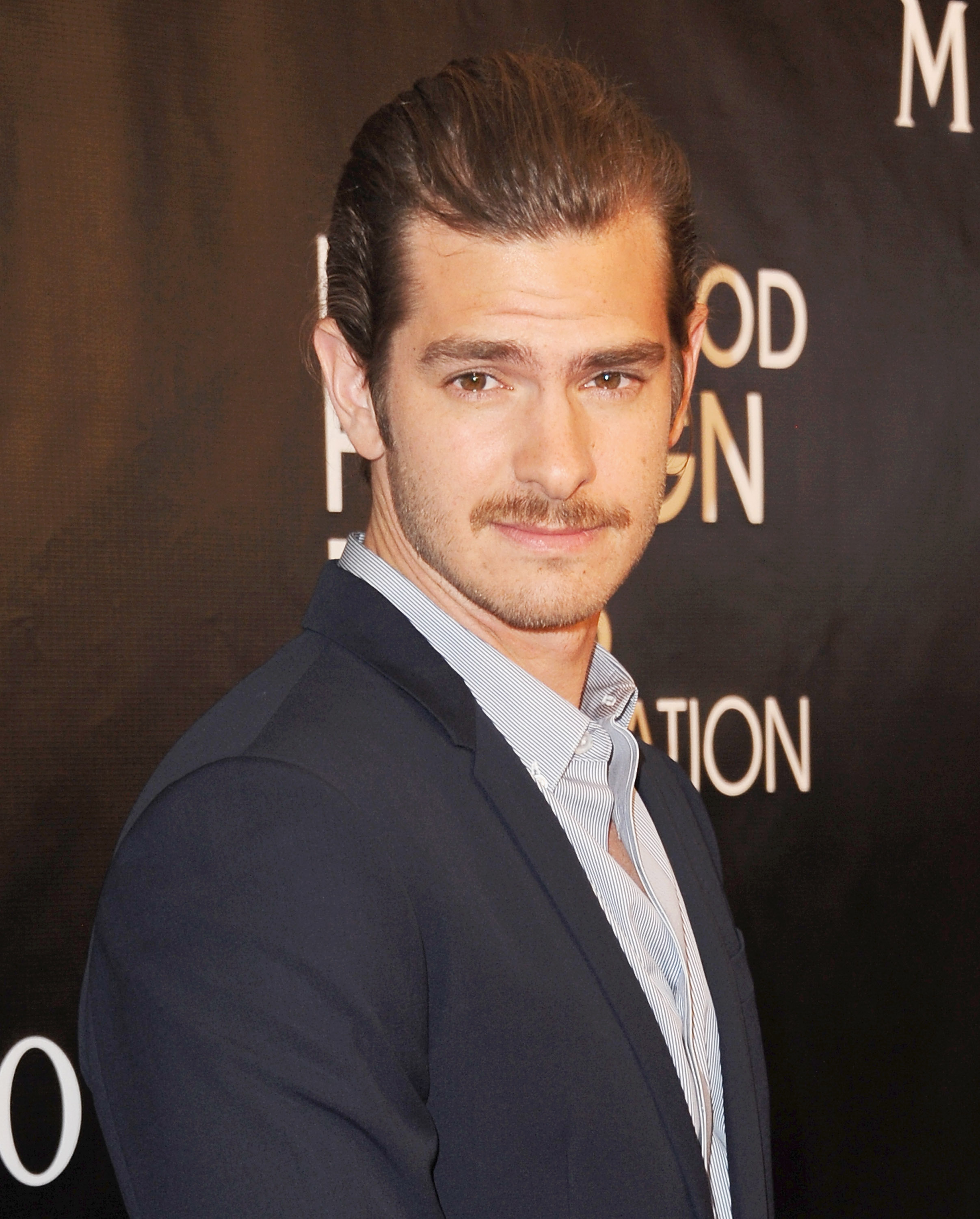 Andrew Garfield arrives at Hollywood Foreign Press Association Hosts Annual Grants Banquet at the Beverly Wilshire Four Seasons Hotel on August 13, 2015 in Beverly Hills, California.