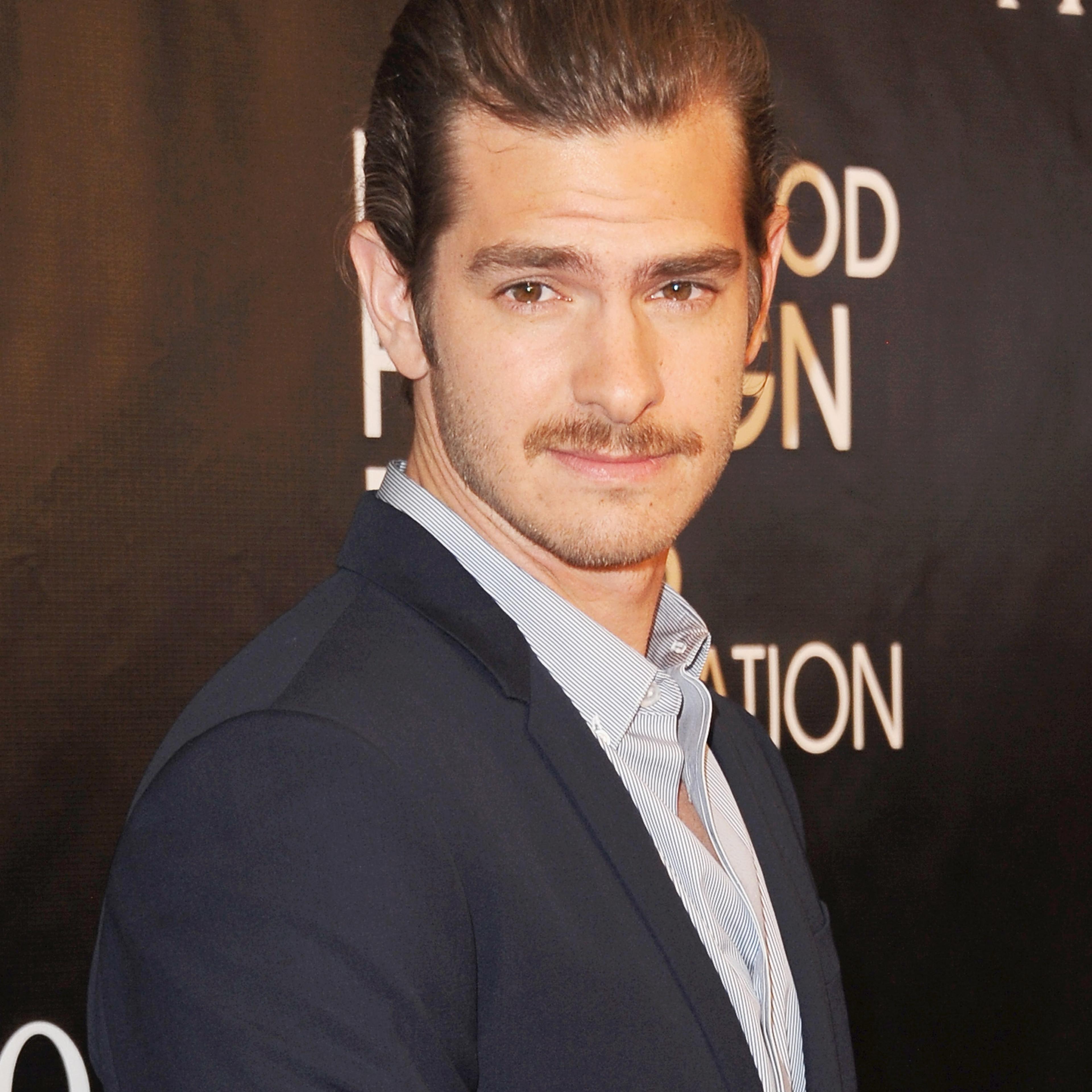Andrew Garfield arrives at Hollywood Foreign Press Association Hosts Annual Grants Banquet at the Beverly Wilshire Four Seasons Hotel on August 13, 2015 in Beverly Hills, California.