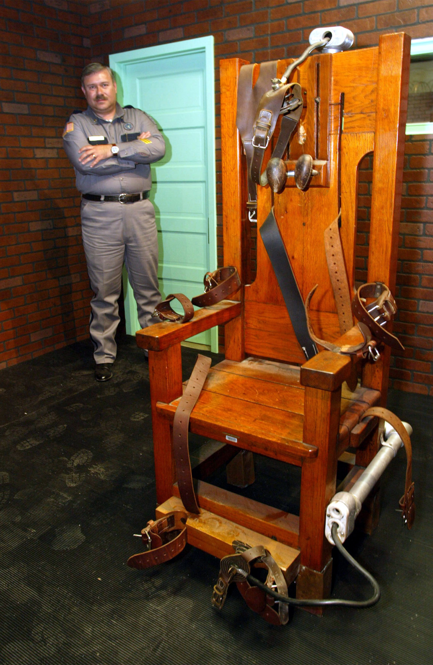 Aaron Dickson, President of the Board of Directors of the Texas Prison Museum stands on November 19,..