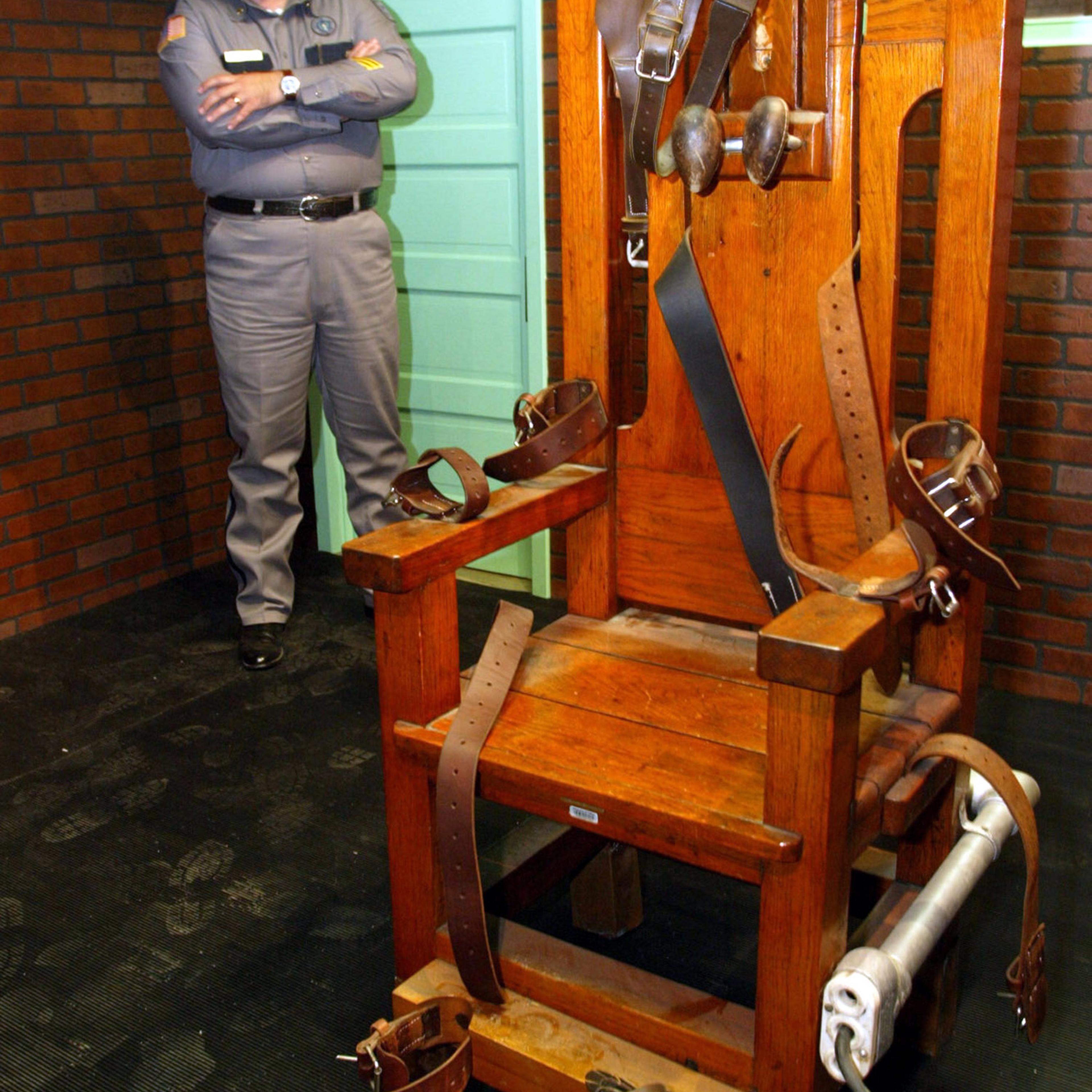 Aaron Dickson, President of the Board of Directors of the Texas Prison Museum stands on November 19,..
