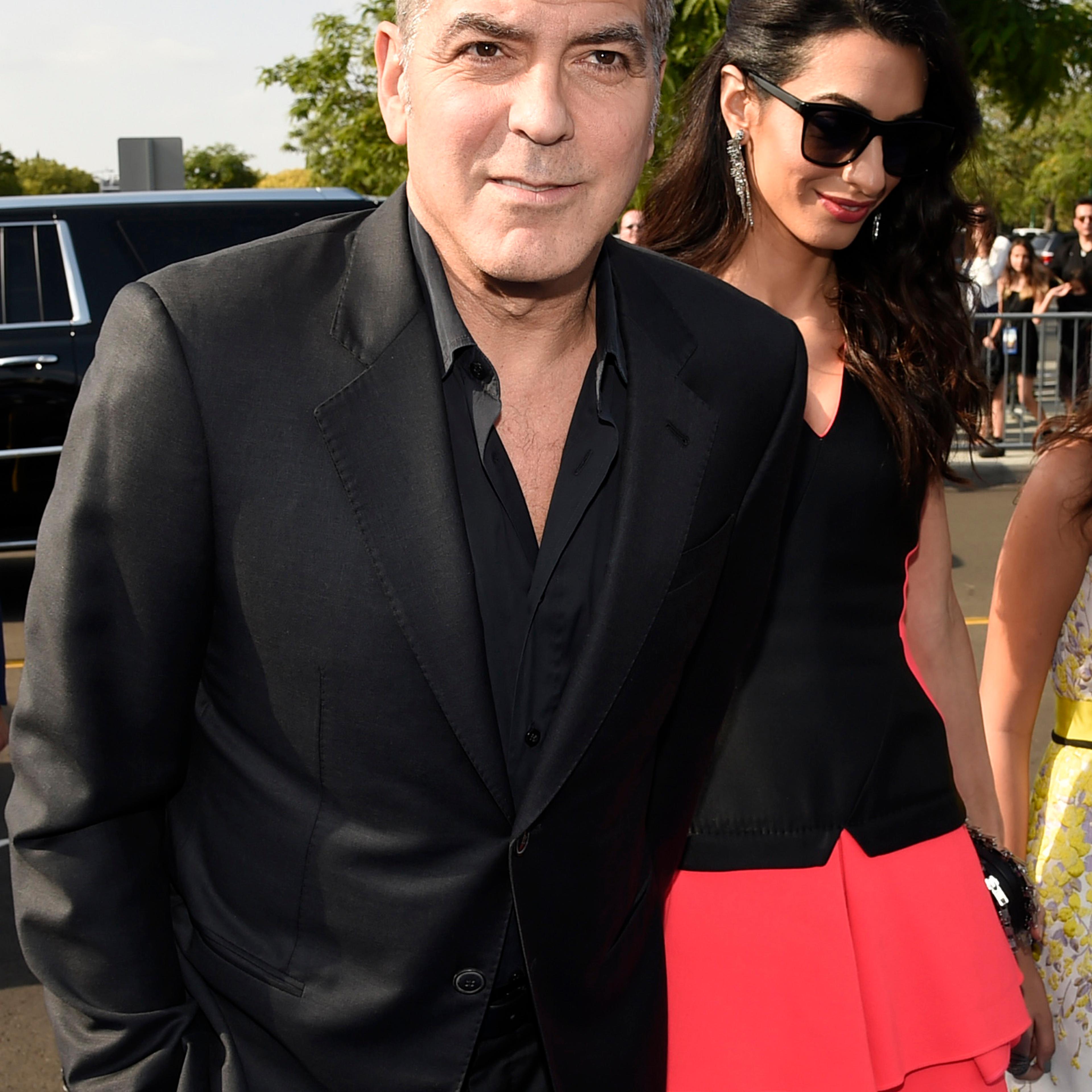 George Clooney and Amal Clooney arrive at the world premiere of "Tomorrowland" at AMC Downtown Disney on May 9, 2015, in Anaheim, Calif.