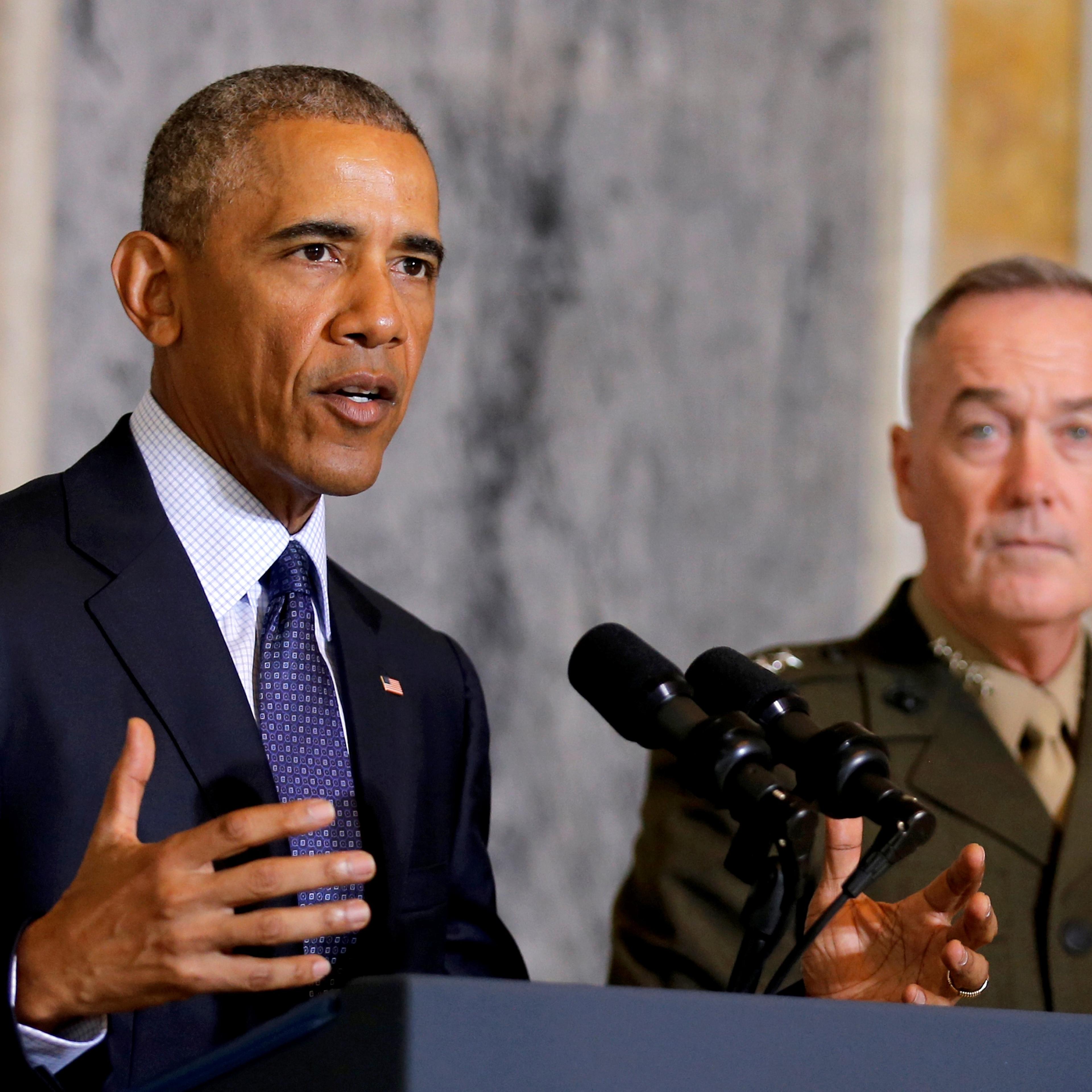 U.S. President Barack Obama delivers a statement accompanied by Director of National Intelligence James Clapper and Chairman of the Joint Chiefs of Staff General Joseph Dunford after a meeting with Obama's national security team