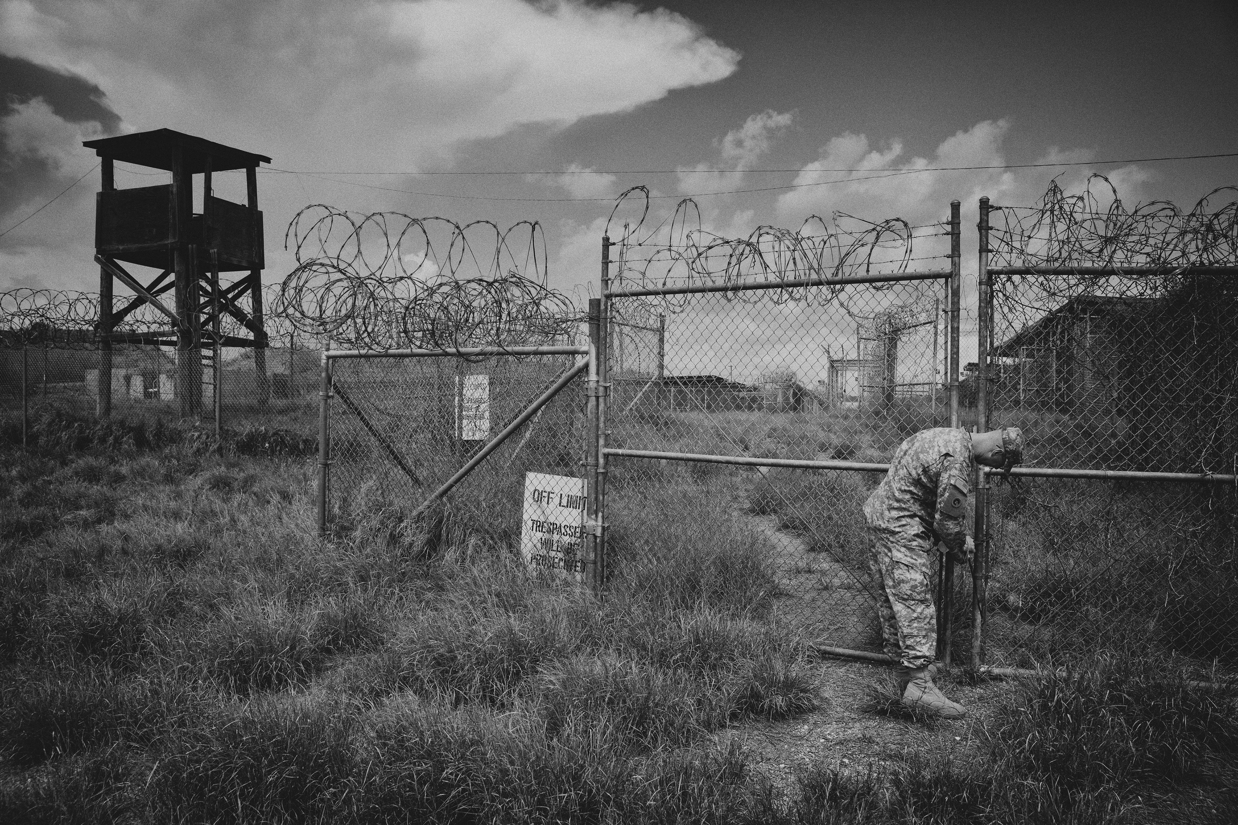 A public affairs representative at Camp X-Ray for a tour of the defunct facility during a media visit to the Guantanamo Bay U.S. Naval Base in Cuba.
