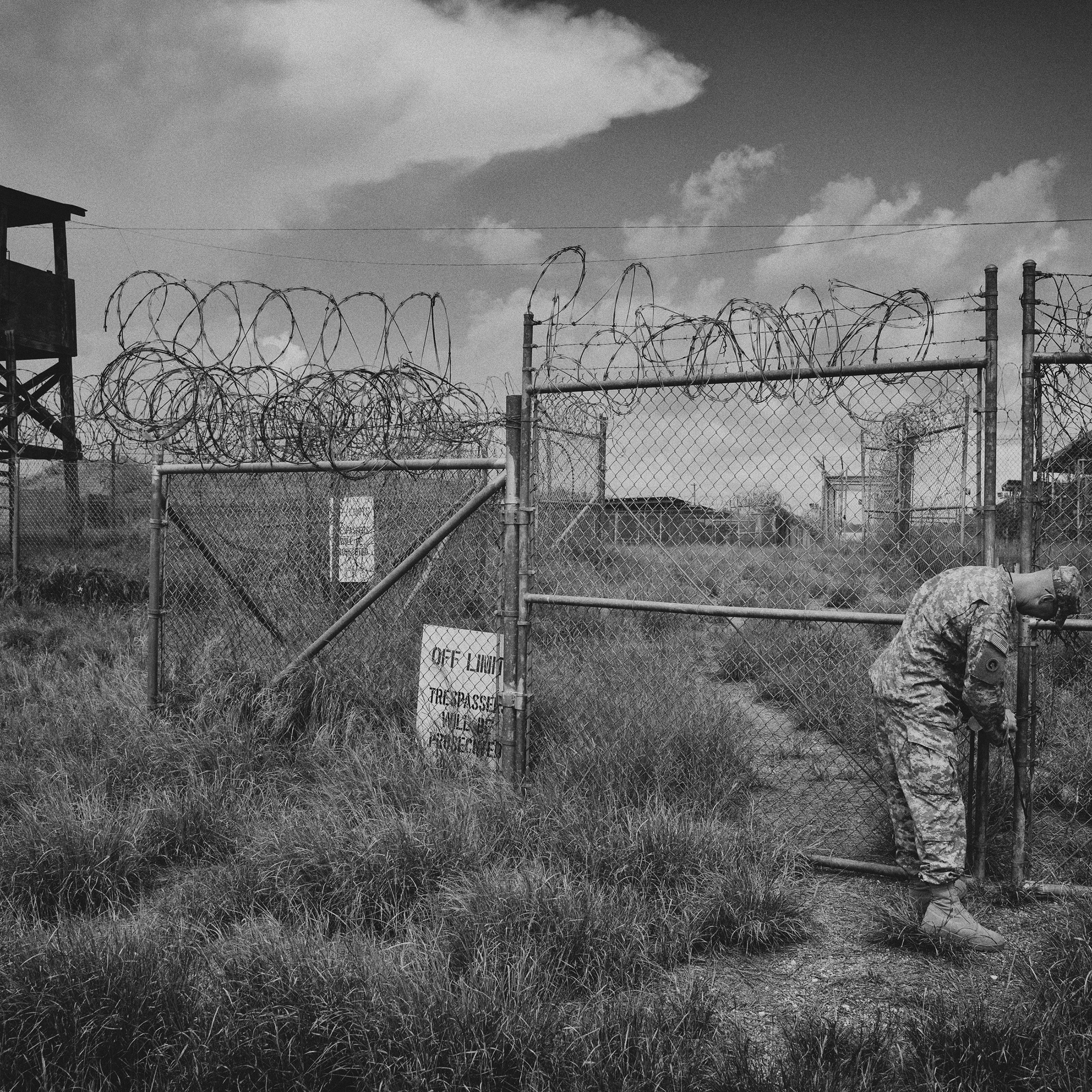 A public affairs representative at Camp X-Ray for a tour of the defunct facility during a media visit to the Guantanamo Bay U.S. Naval Base in Cuba.