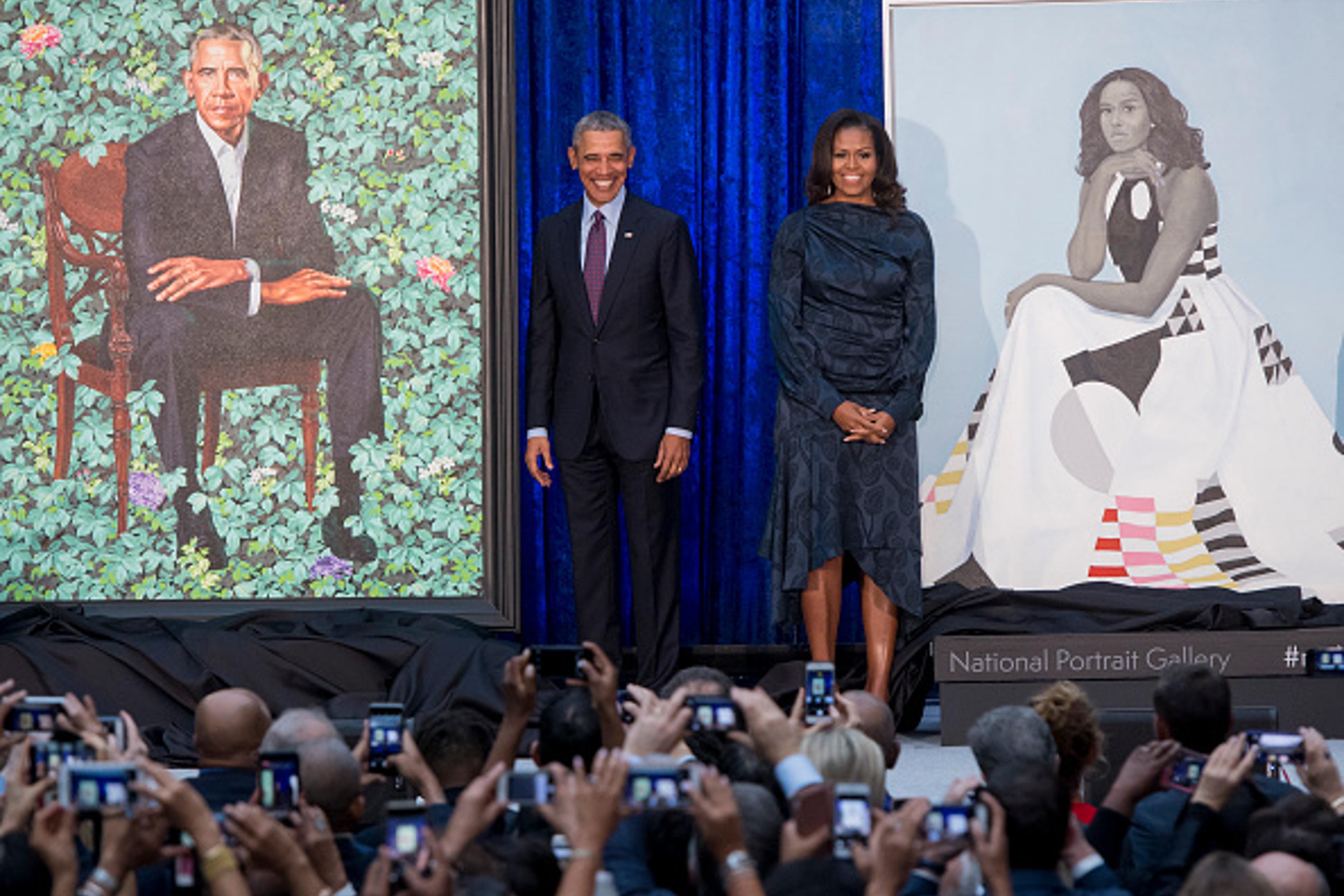 Former U.S. President Barack Obama and First Lady Michelle Obama at the unveiling of their portraits at the Smithsonian's National Portrait Gallery in Washington, DC, February 12, 2018.