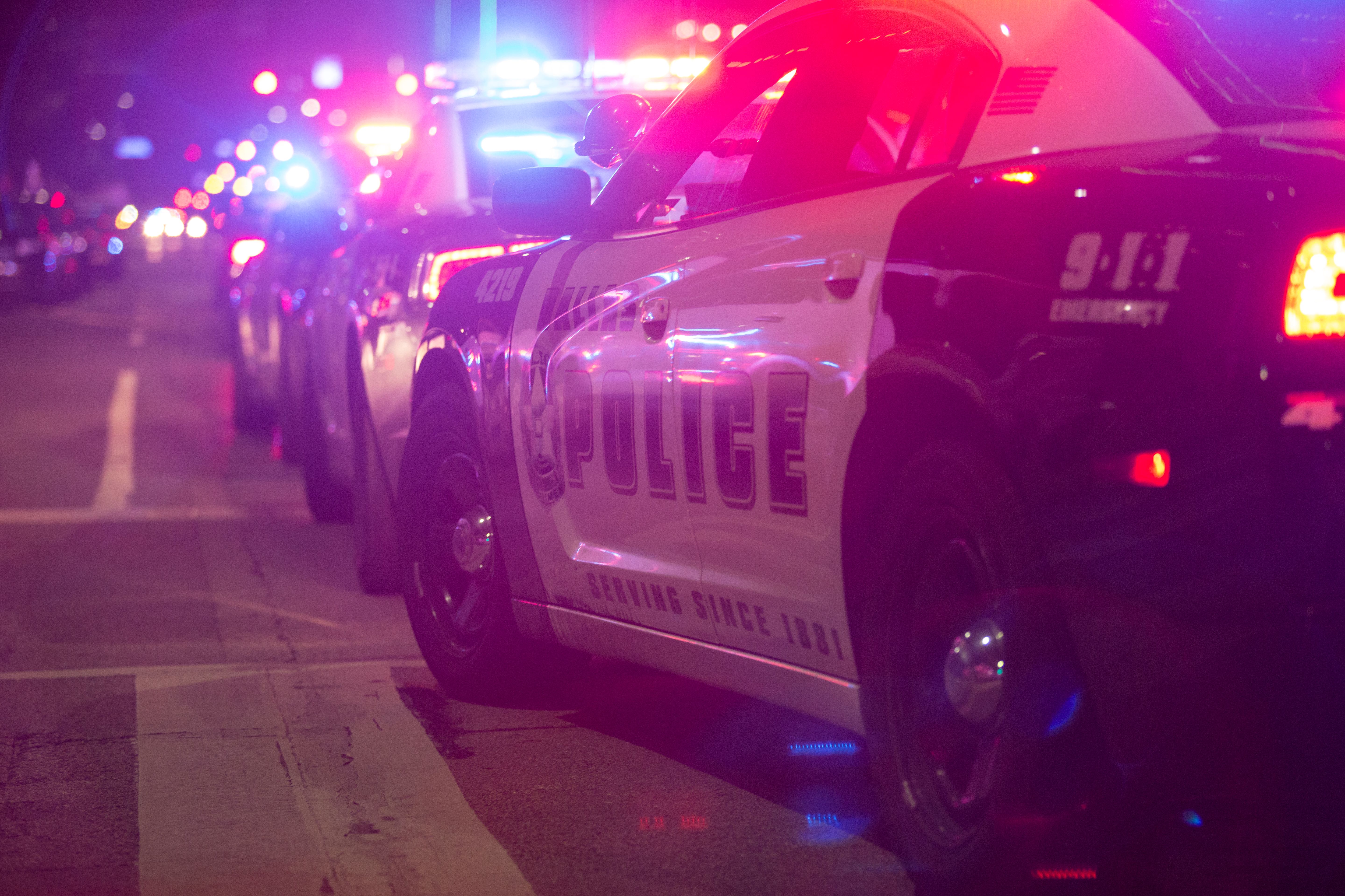Police cars sit on Main Street in Dallas following the sniper shooting during a protest on July 7, 2016.