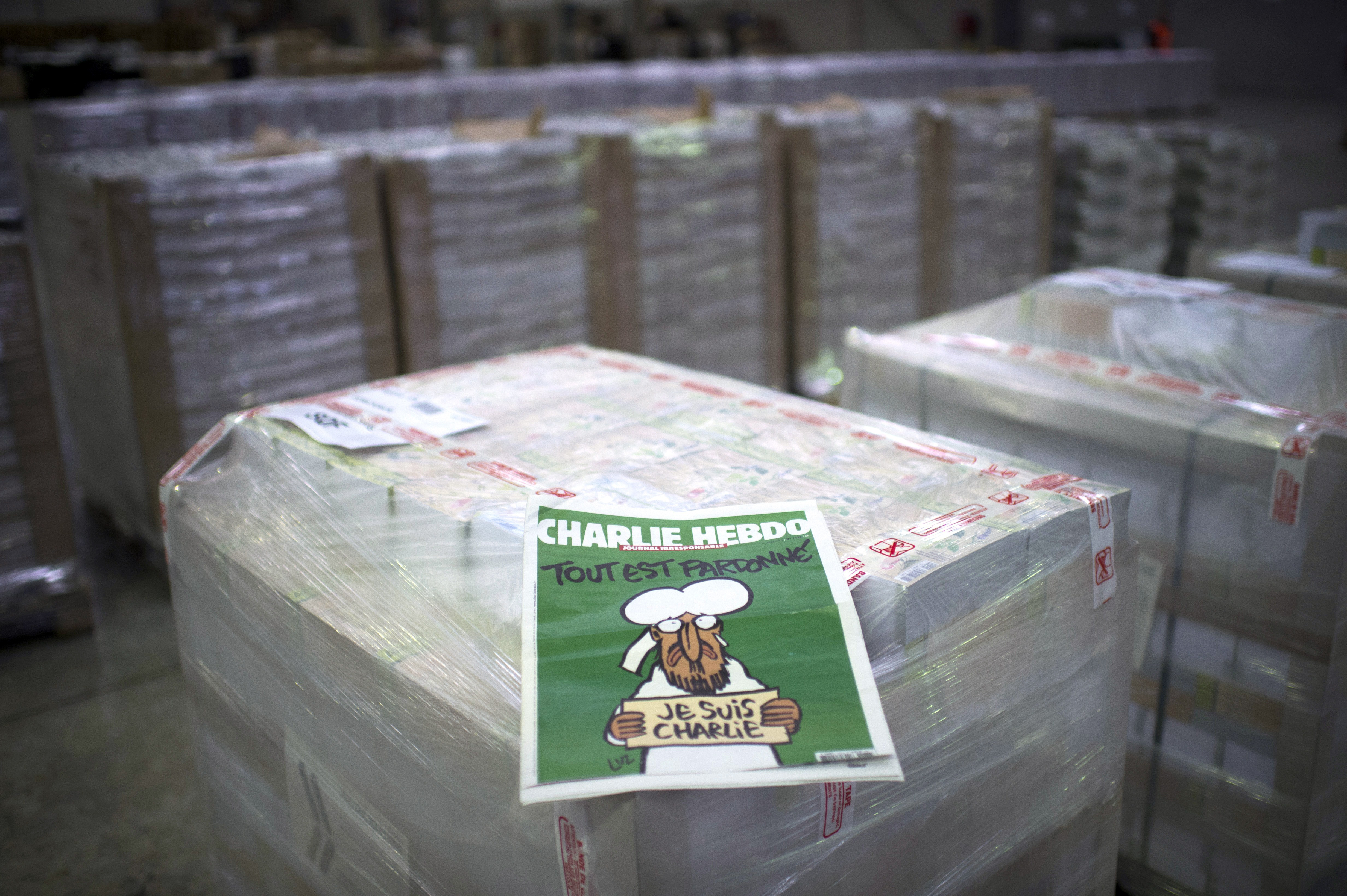 The weekly newspaper Charlie Hebdo, on January 13, 2015 in Villabe, south of Paris, a week after two jihadist gunmen stormed the Paris offices of the satirical magazine, killing 12 people including some of the country's best-known cartoonists. Its cover 