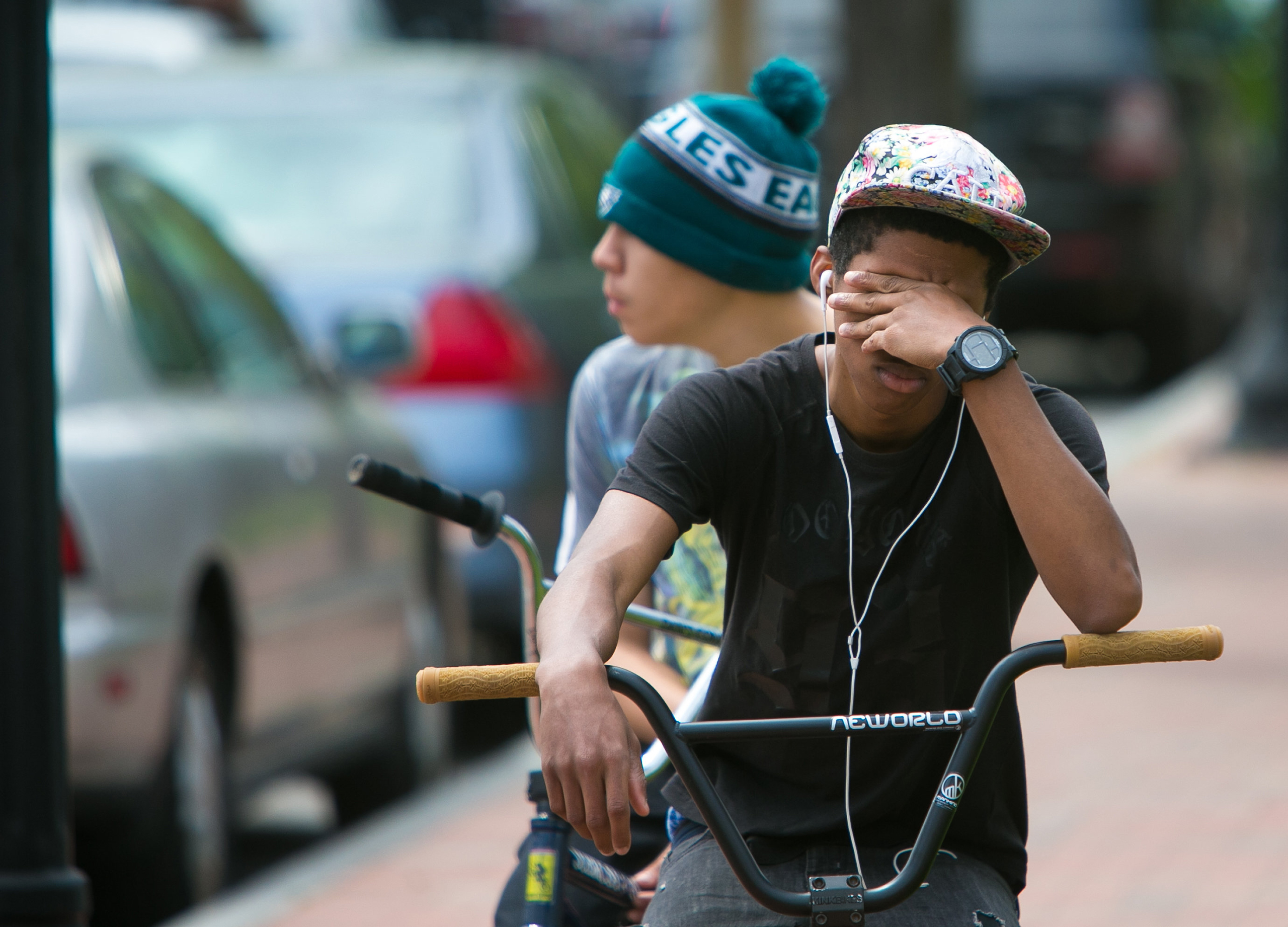 A student cries in front of Howard High School of Technology in Wilmington, Del. on April 21, 2016.