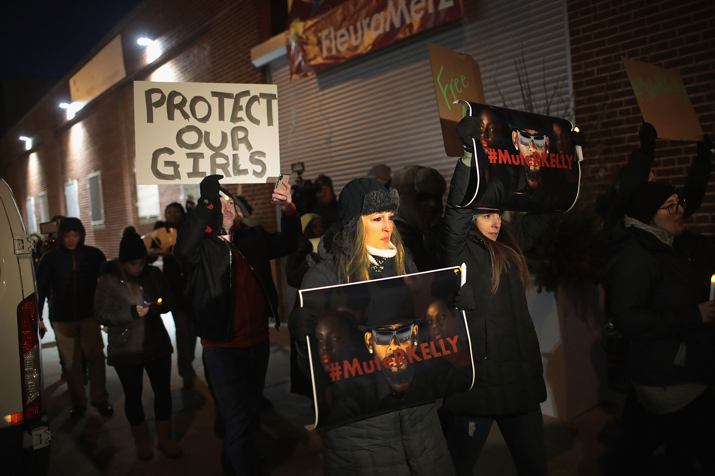 Demonstrators gather near the studio of singer R. Kelly to call for a boycott of his music after allegations of sexual abuse against young girls in Chicago, on Jan. 09, 2019.