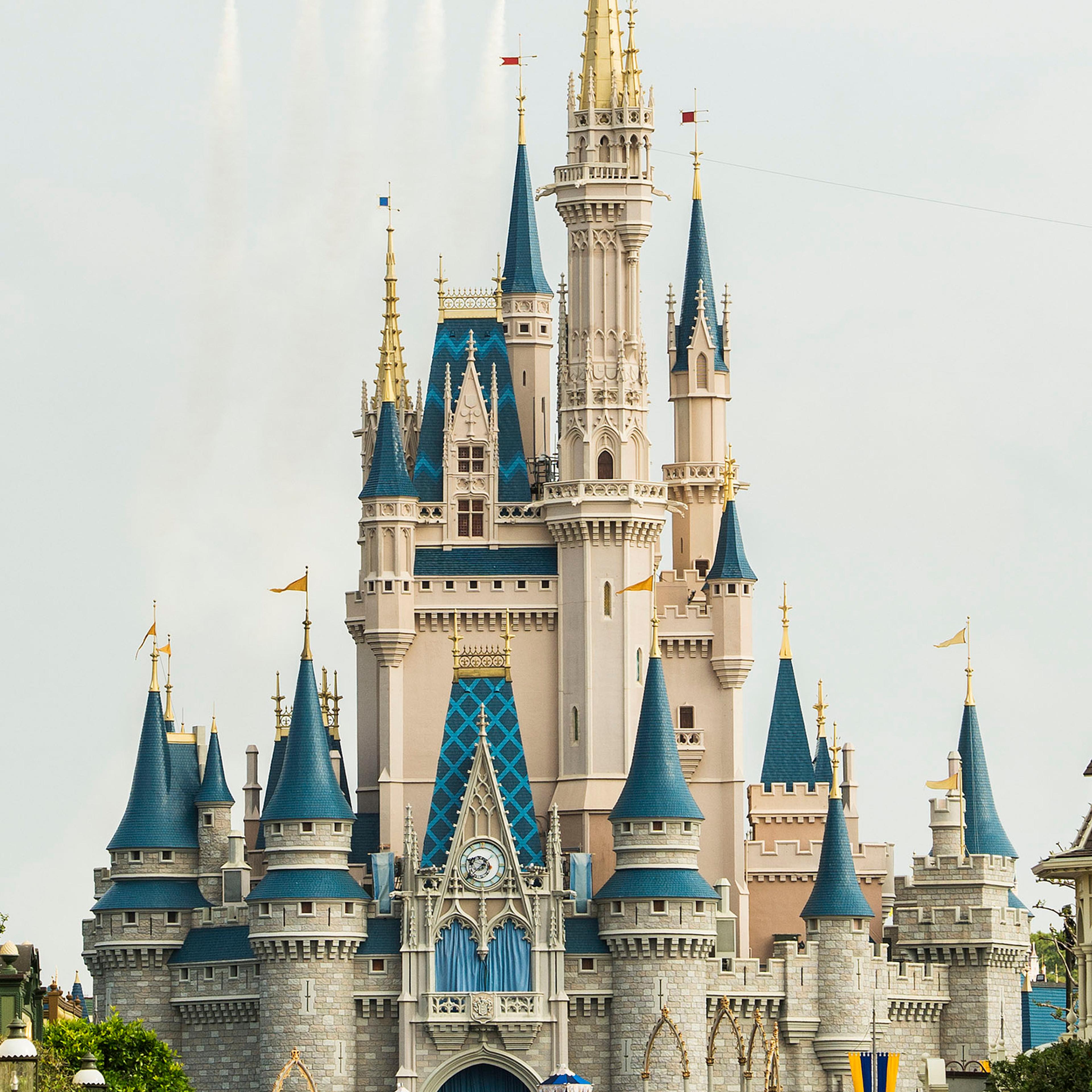 U.S. Navy Blue Angels Soar Above Cinderella Castle At Walt Disney World Resort
