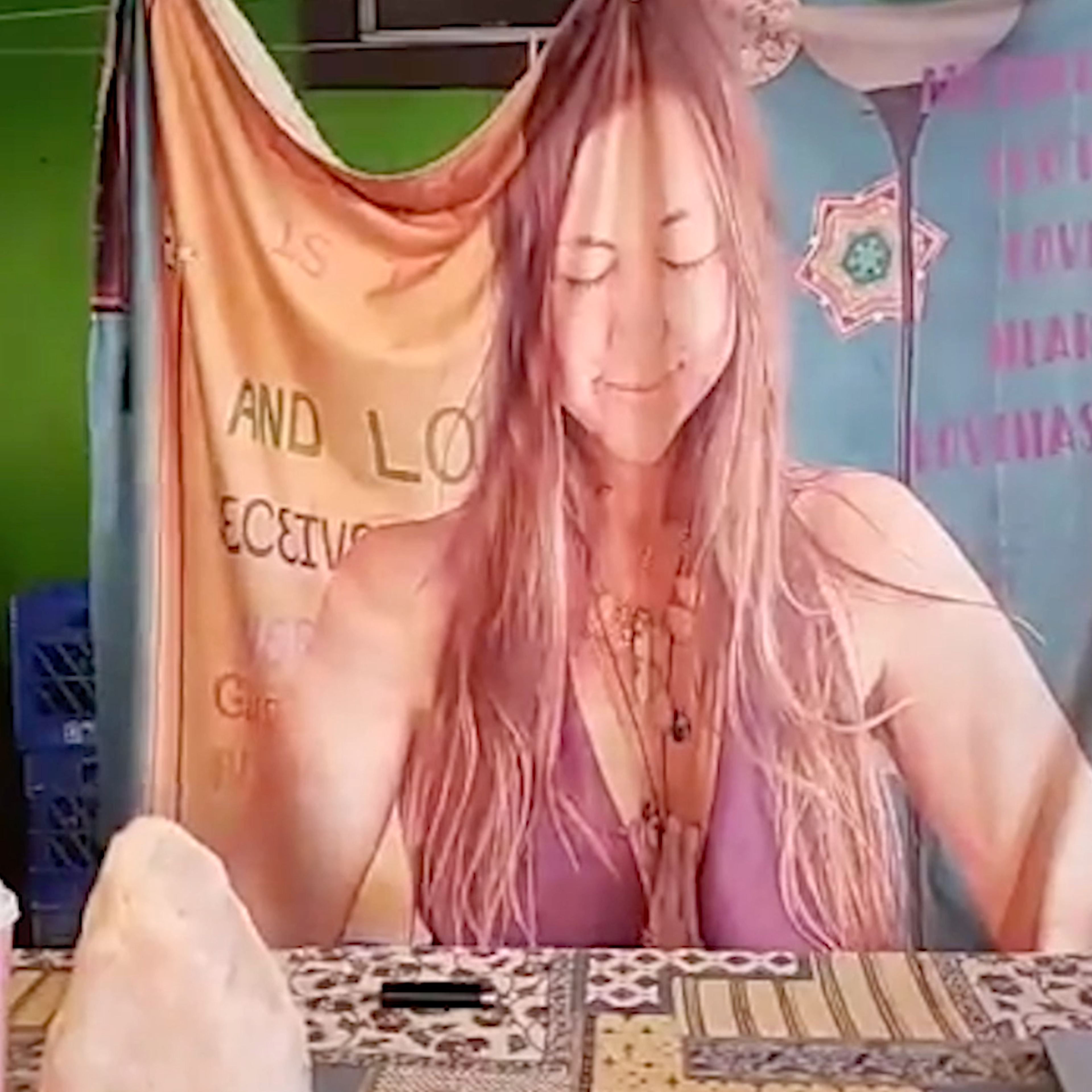 A banner paying tribute to Amy Carlson shown in the HBO docuseries 'Love Has Won: The Cult of Mother God'