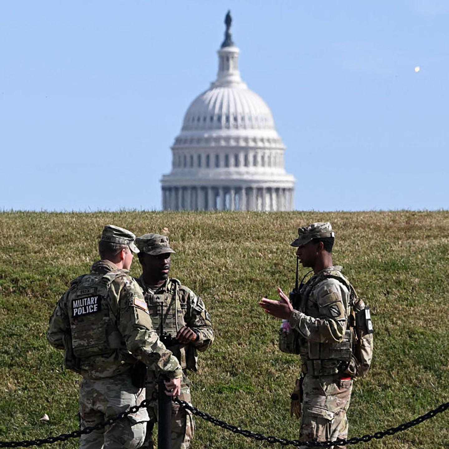 Members of the National Guard patrol on the National Mall with the U.S. Capitol in the background in Washington, D.C., on Nov. 5, 2025.