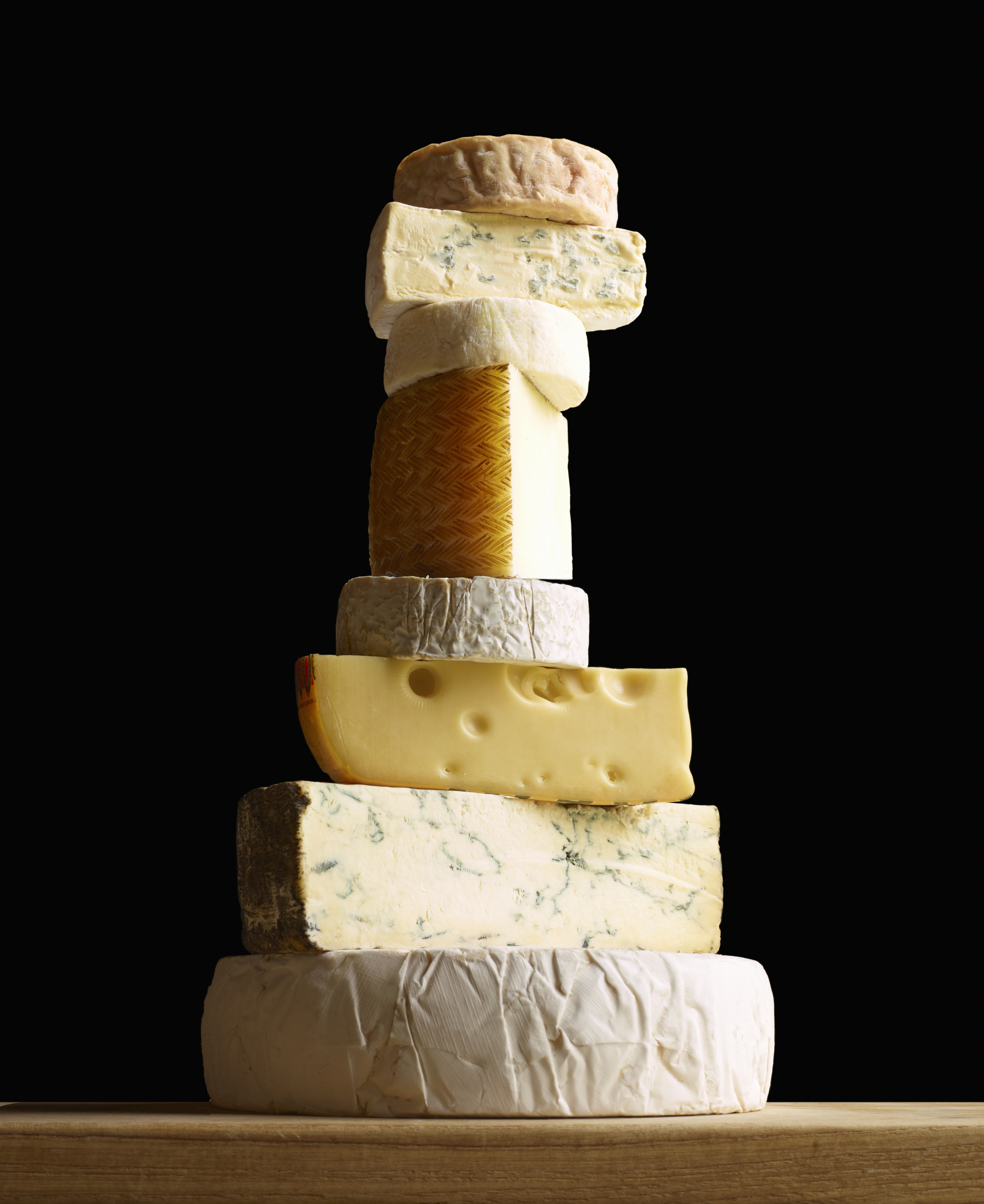 Stack of selection of cheeses