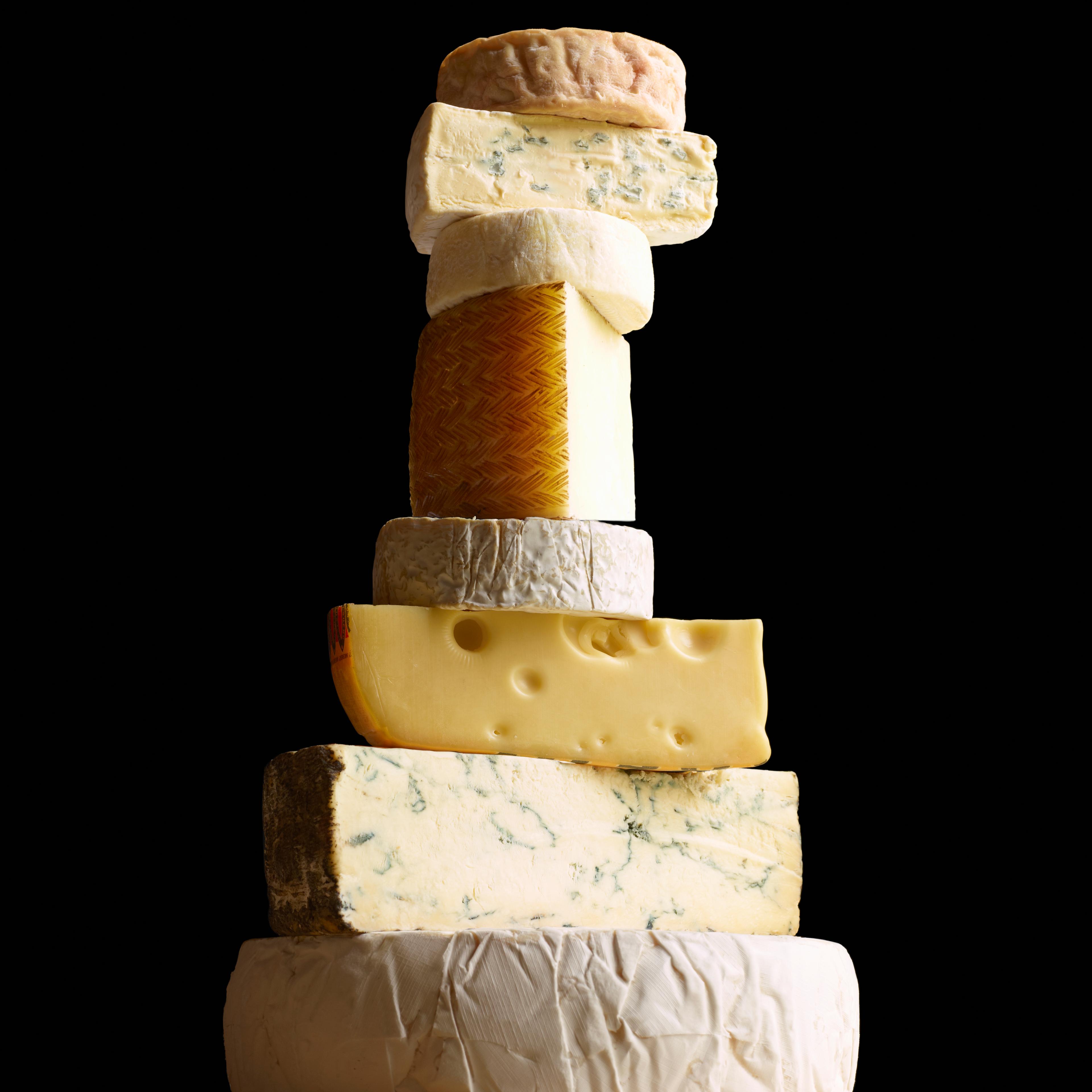 Stack of selection of cheeses