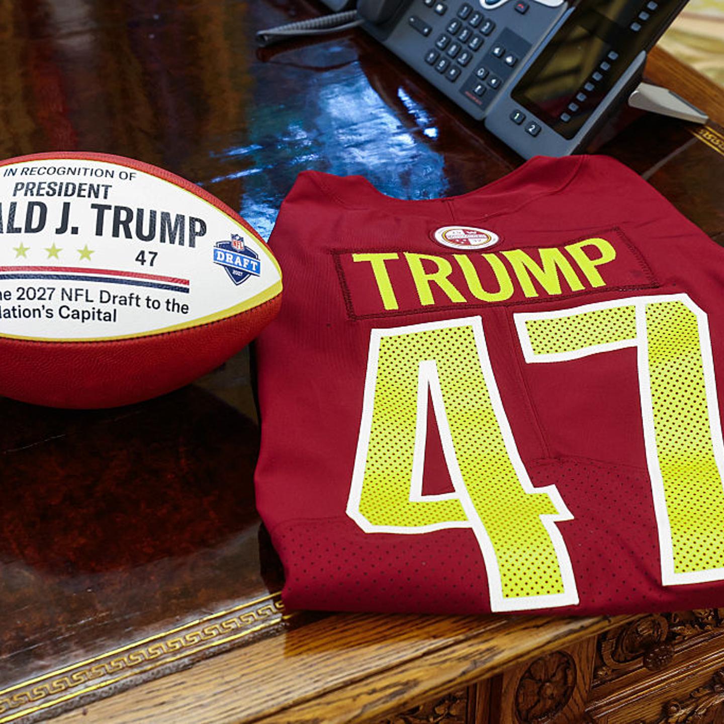 A football and jersey displaying U.S. President Donald Trump's name in the Oval Office of the White House in Washington, D.C., on May 5, 2025.