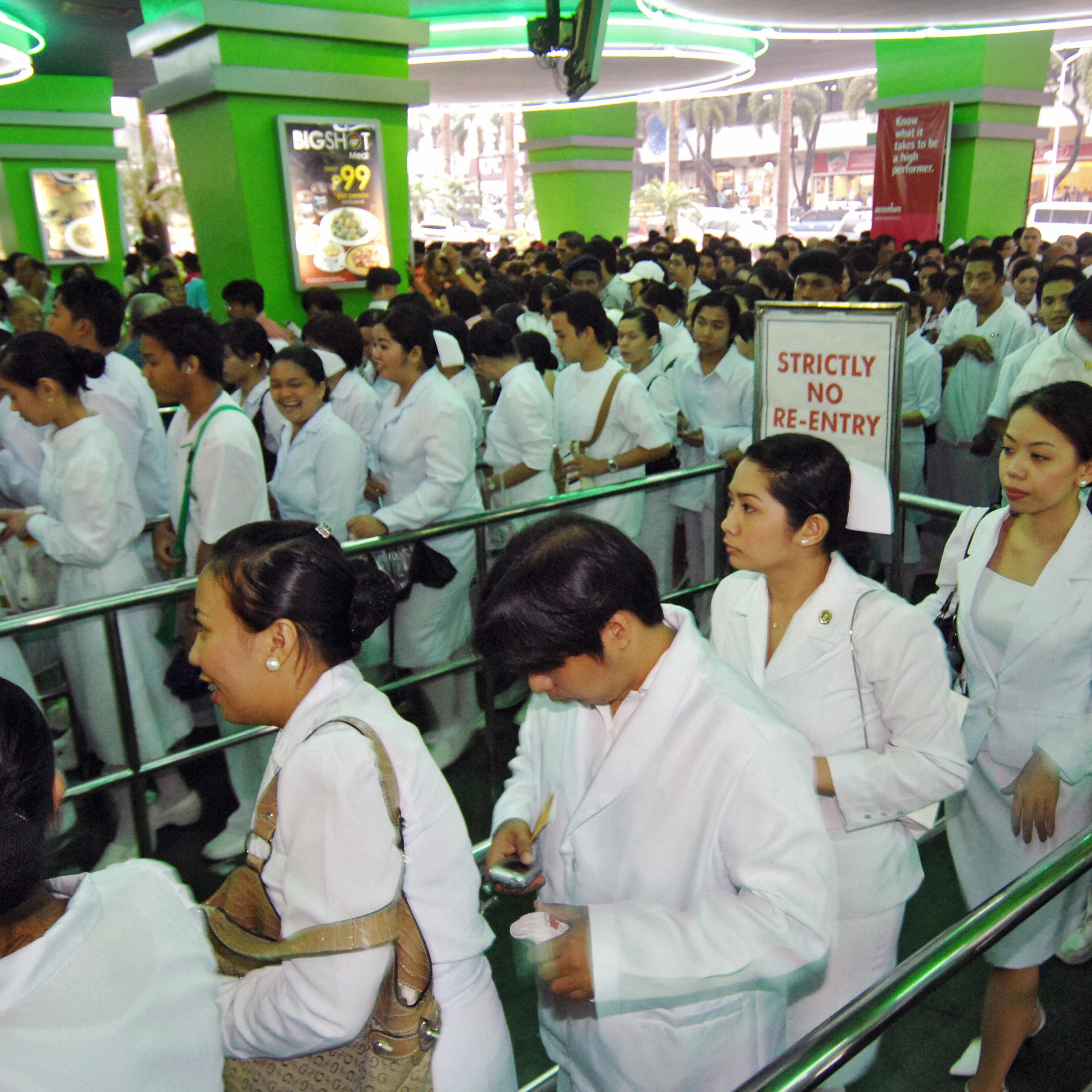 Hundreds of nurses arrive at the Araneta