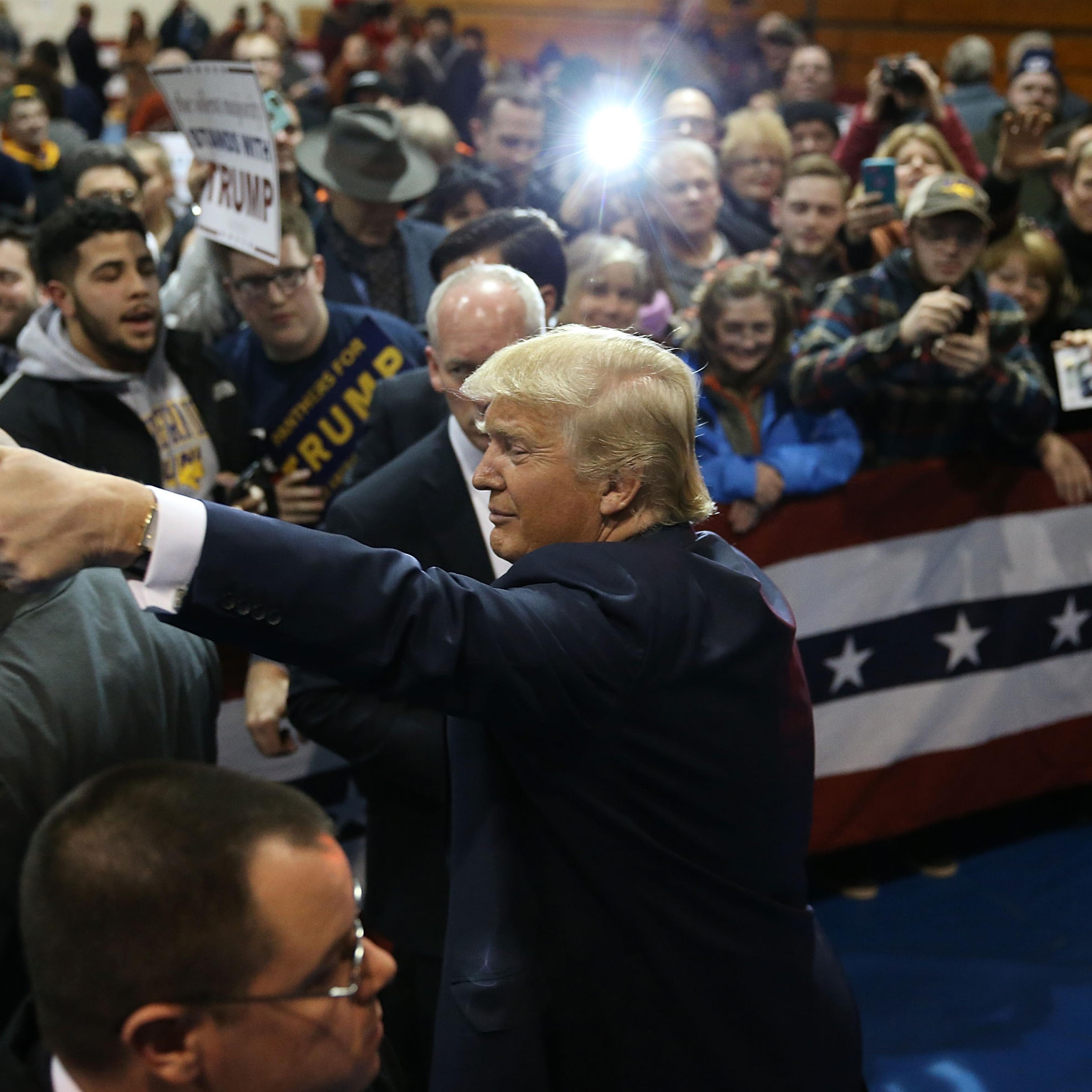 Republican presidential candidate Donald Trump greets people during a campaign event at the University of Northern Iowa in Cedar Falls, Iowa on Jan. 12, 2016.