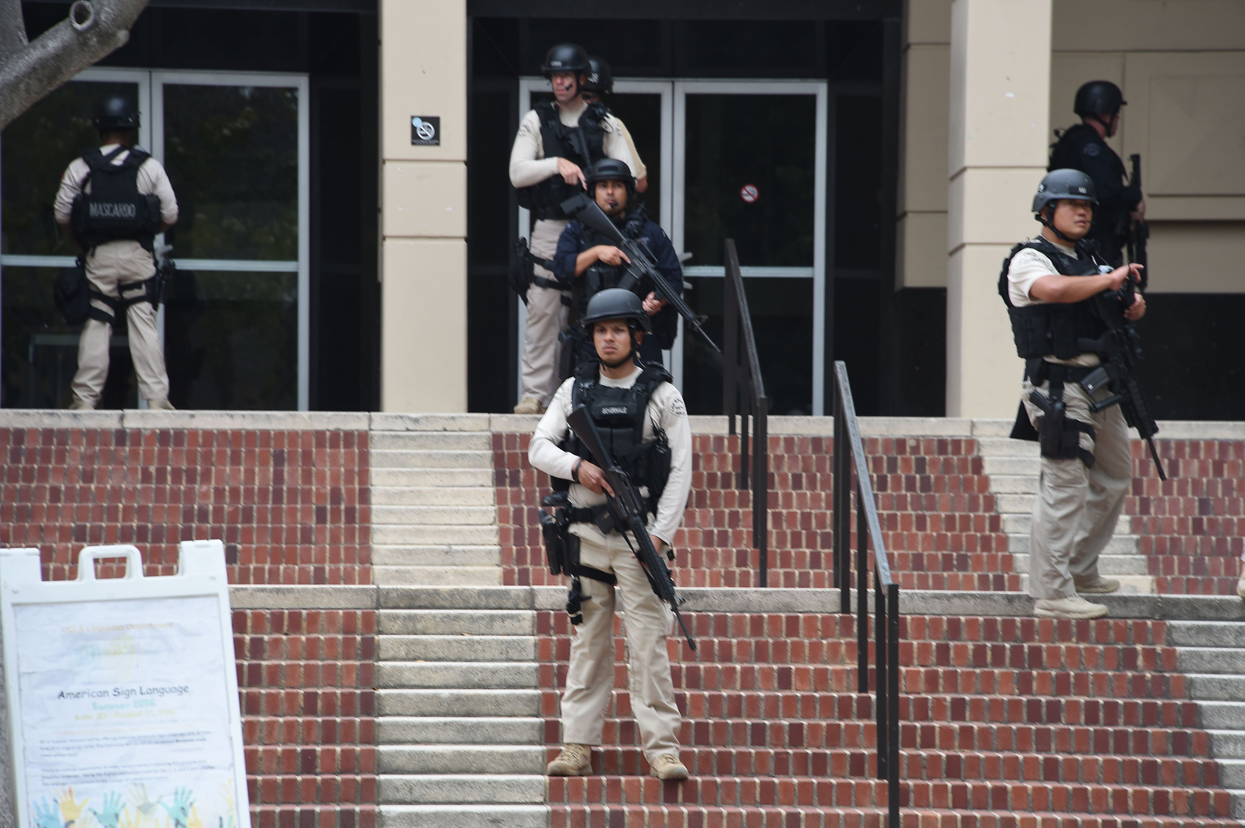 Members of security at the University of California's Los Angeles campus following a shooting where two people were confirmed dead on June 1, 2016.