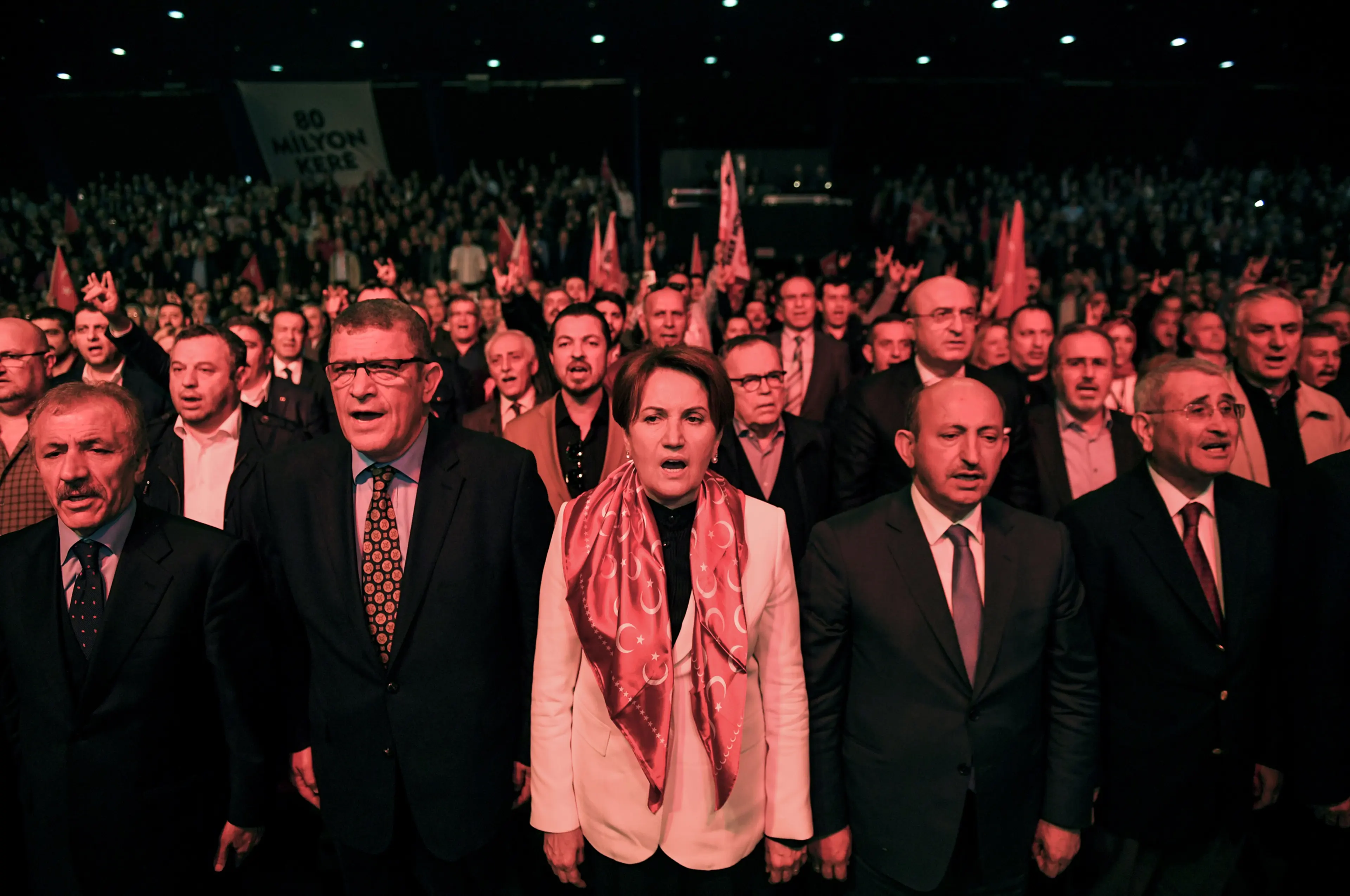 Meral Aksener, center, sings the national anthem as she attends a "NO" campaign meeting on March 28, 2017.