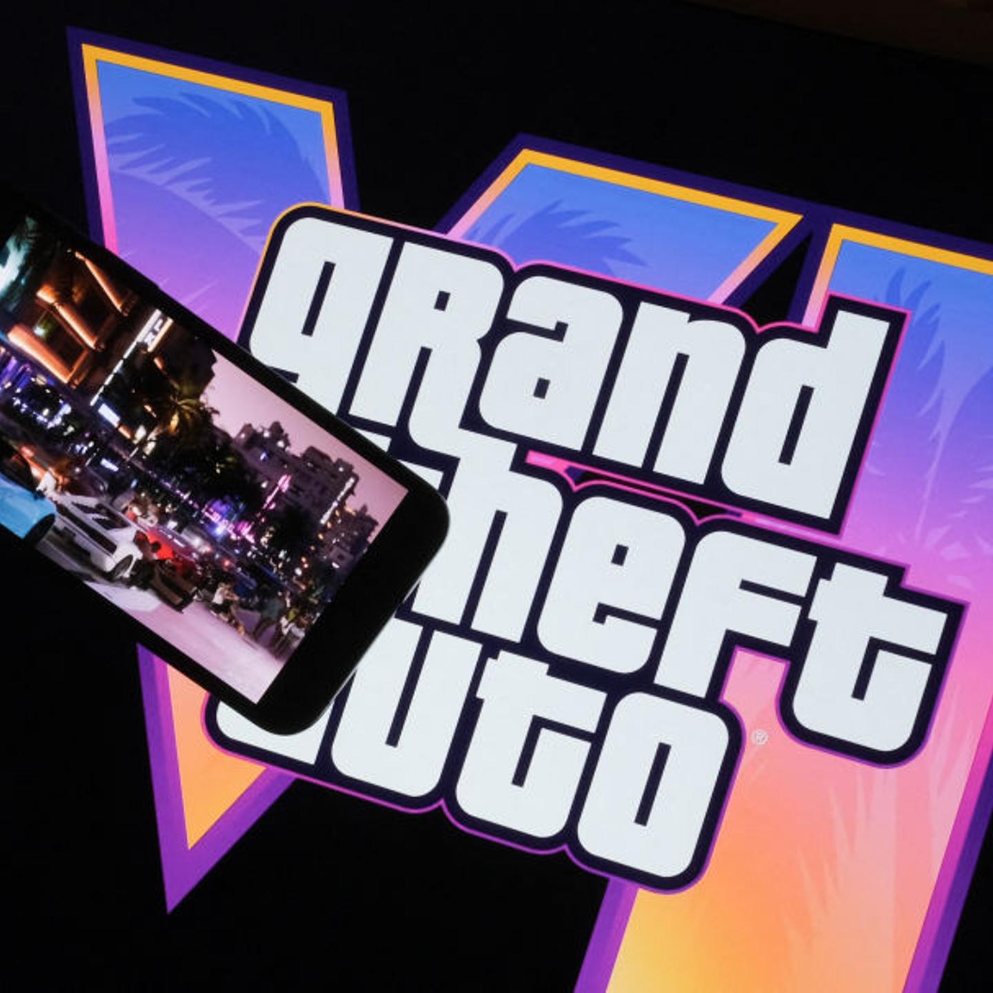 Rockstar Games' Grand Theft Auto VI trailer plays on a screen in front of the game title