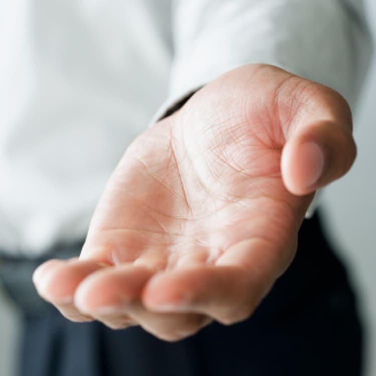 businessman-holding-out-hand