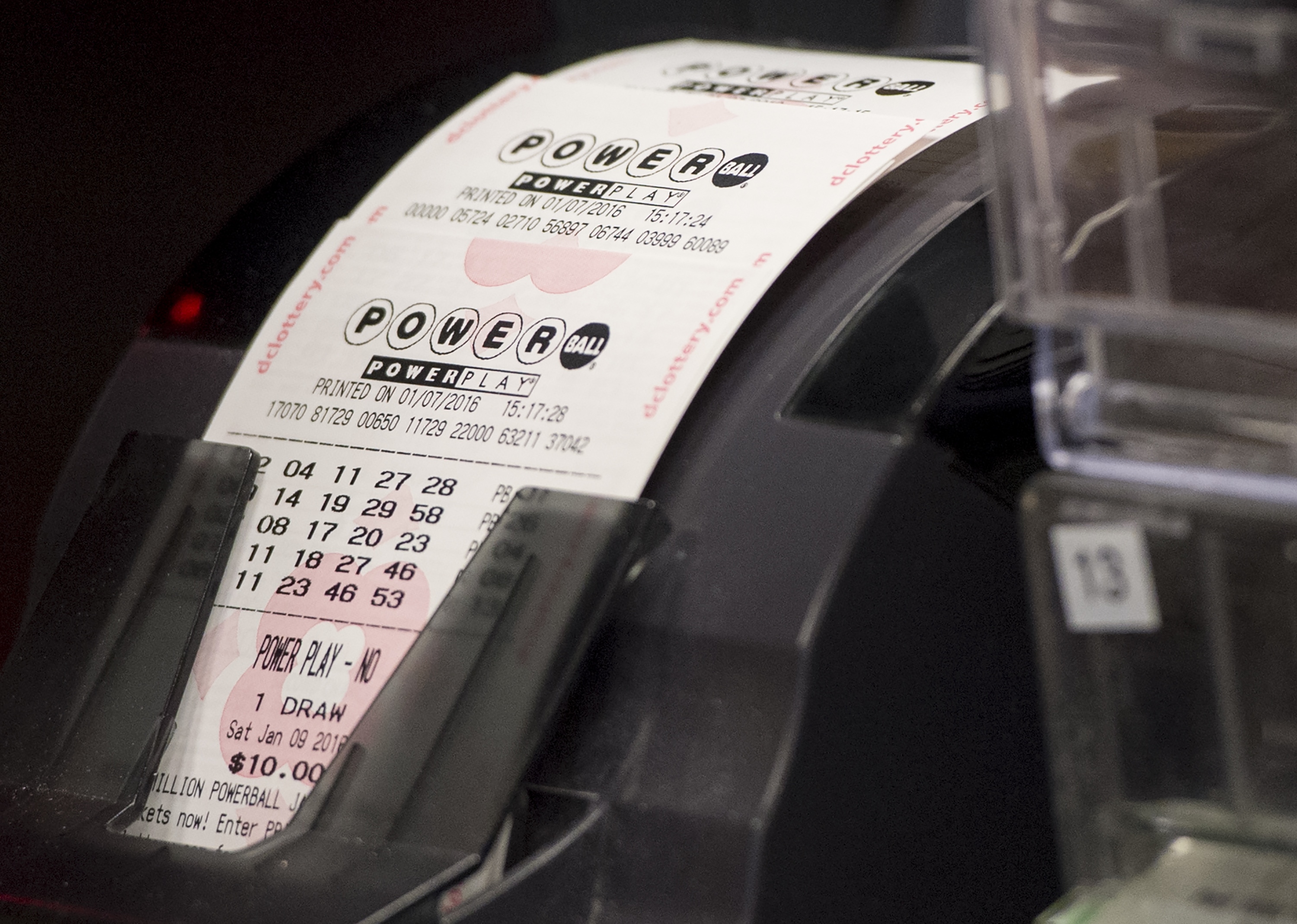 A machine prints Powerball lottery tickets at a convenience store in Washington, DC, January 7, 2016.