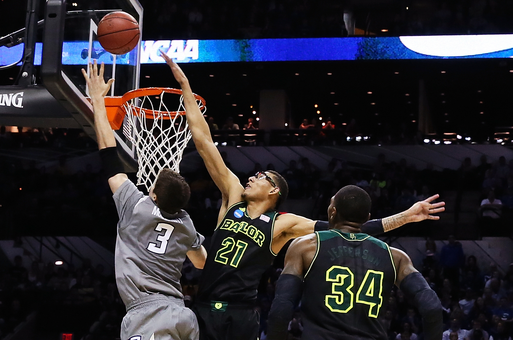 Baylor Bears center Isaiah Austin blocks Creighton Bluejays forward Doug McDermott in the second half of a men's college basketball game during the third round of the 2014 NCAA Tournament at AT&T Center on March 23, 2014 in San Antonio.